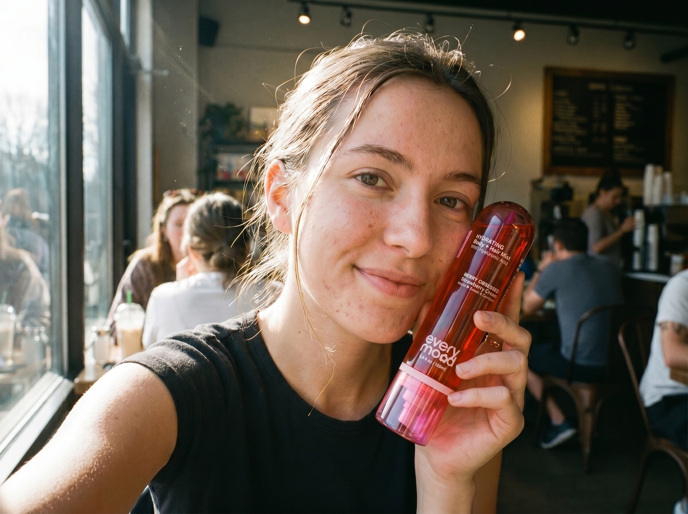 Jess T. customer review — holding Berry Obsessed at a coffee shop