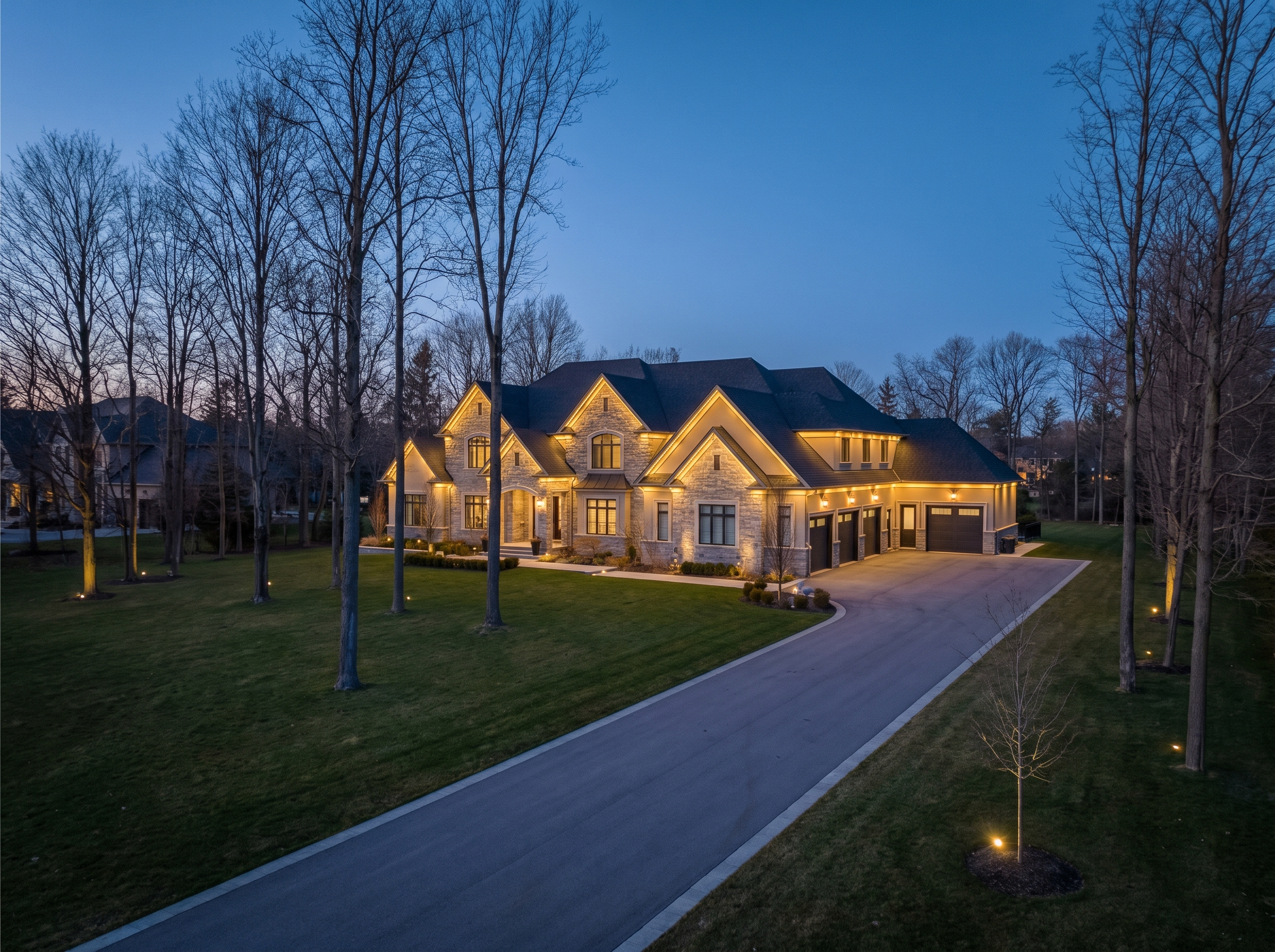 Drone shot of permanent LED lights on a Vaughan estate roofline at dusk