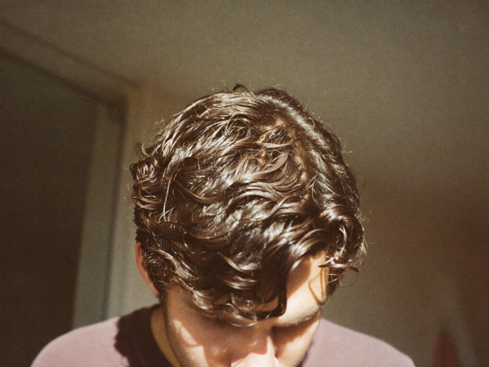 Wavy hair with soft defined waves and a matte finish, no frizz