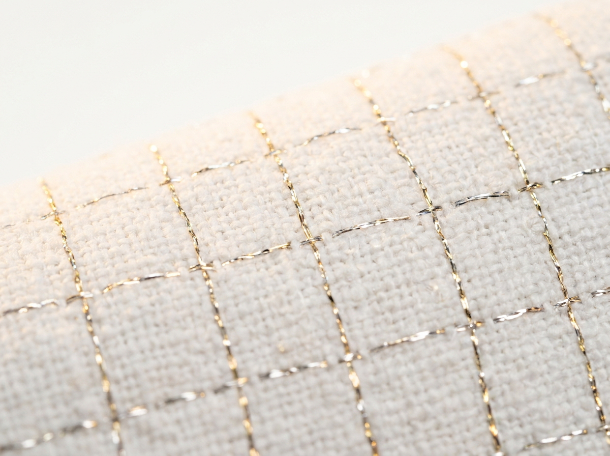 Silver thread woven into GOTS-certified organic cotton