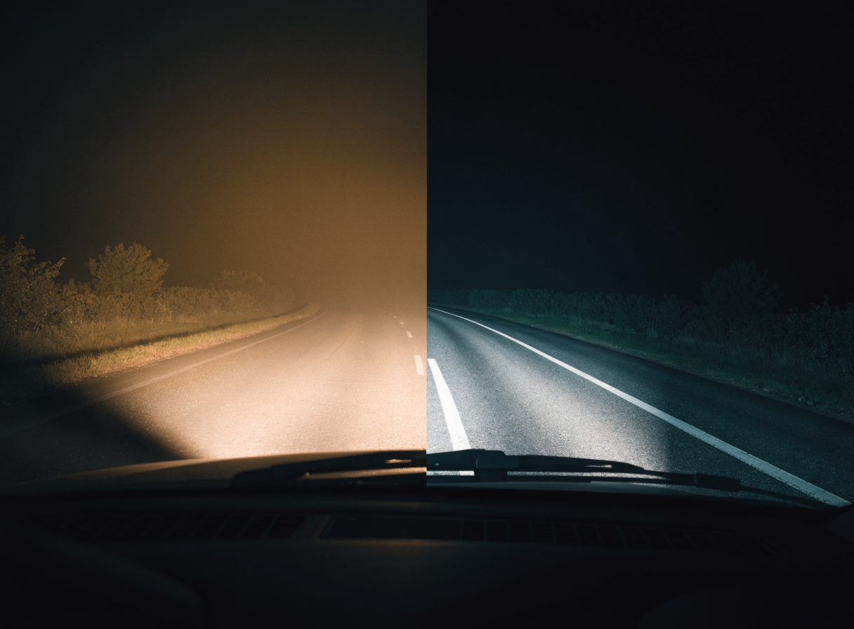 Split night view: murky amber beam with invisible lane lines vs. crisp white beam with bright lane lines
