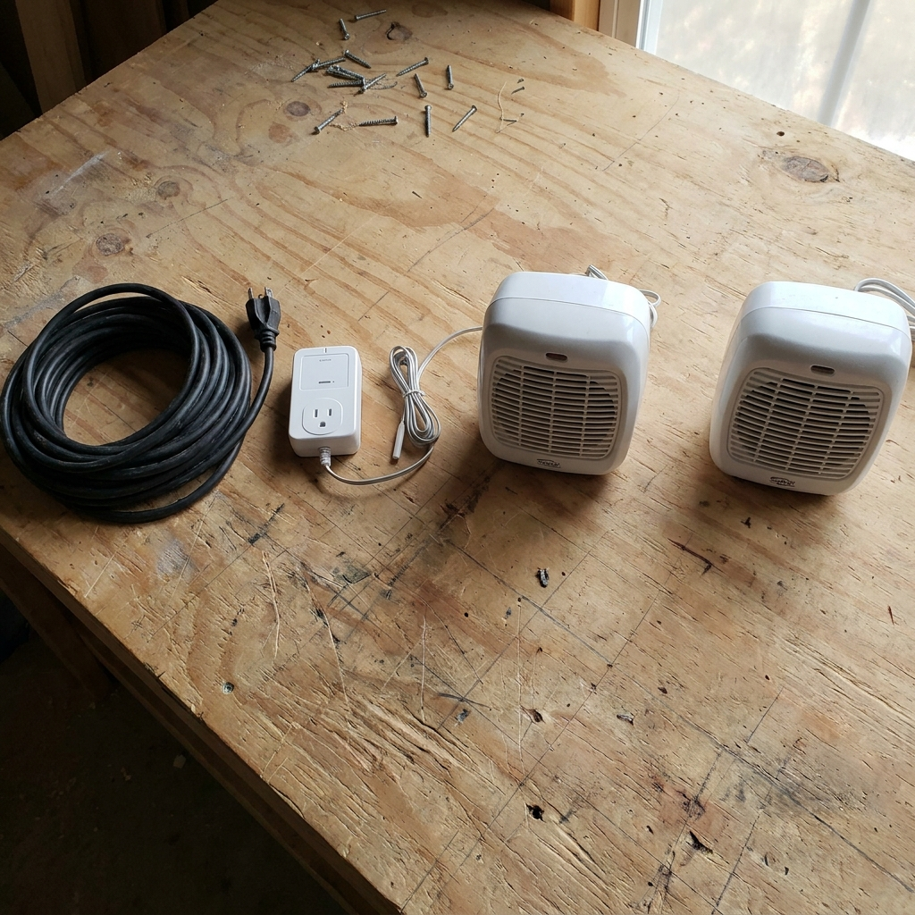 Four components laid out on a workbench