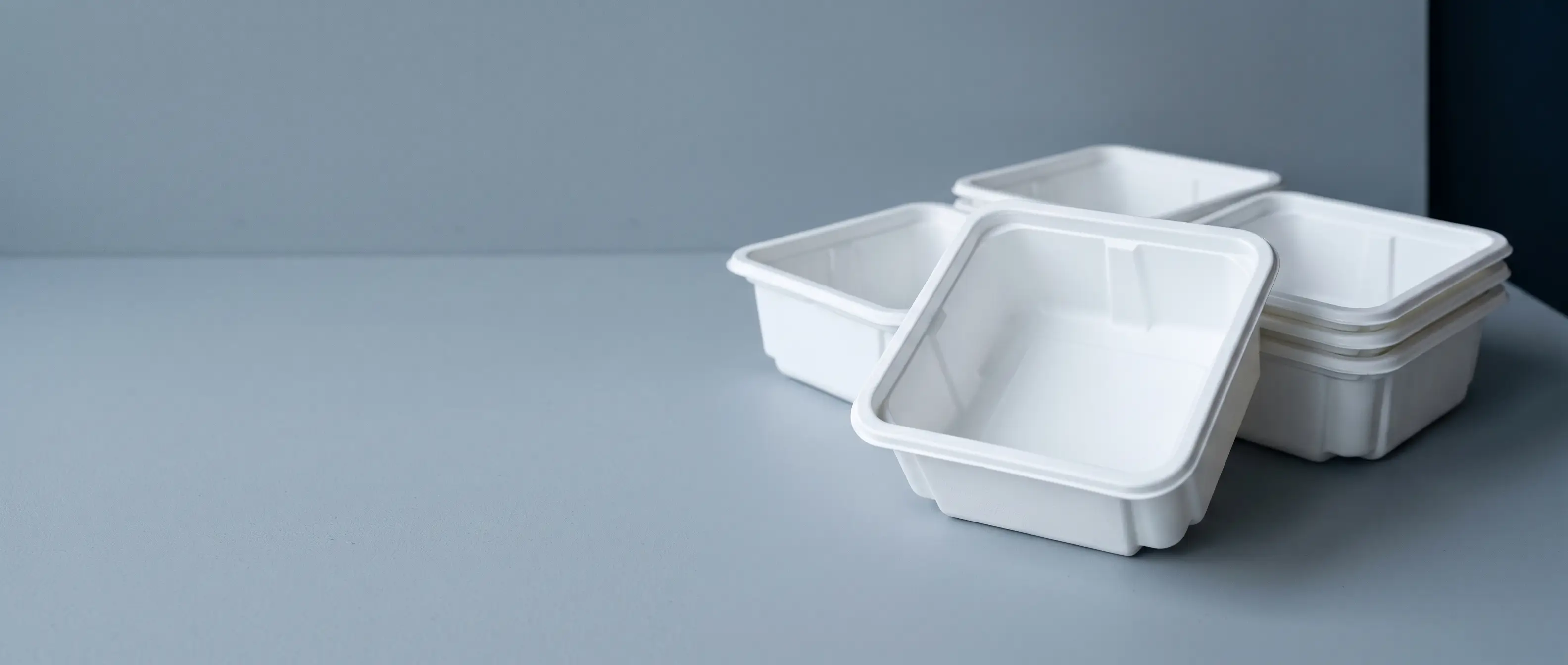 Formed opaque HDPE tray for durable, industrial and chemical-contact packaging