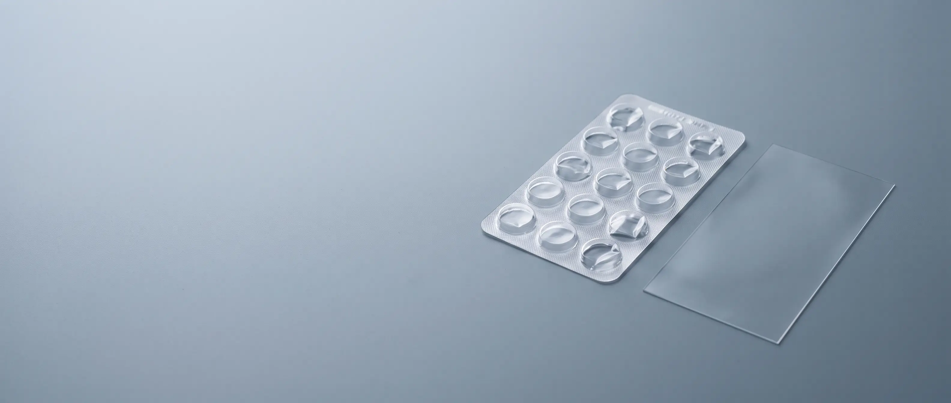 Formed clear PCTFE/PVC blister pack for highly moisture-sensitive pharmaceuticals