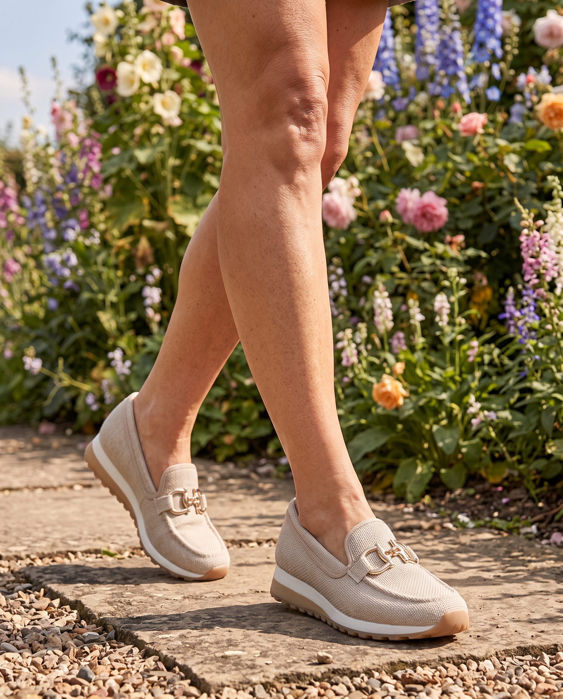 Mili Orthopaedic Loafer Sneakers worn on a garden path