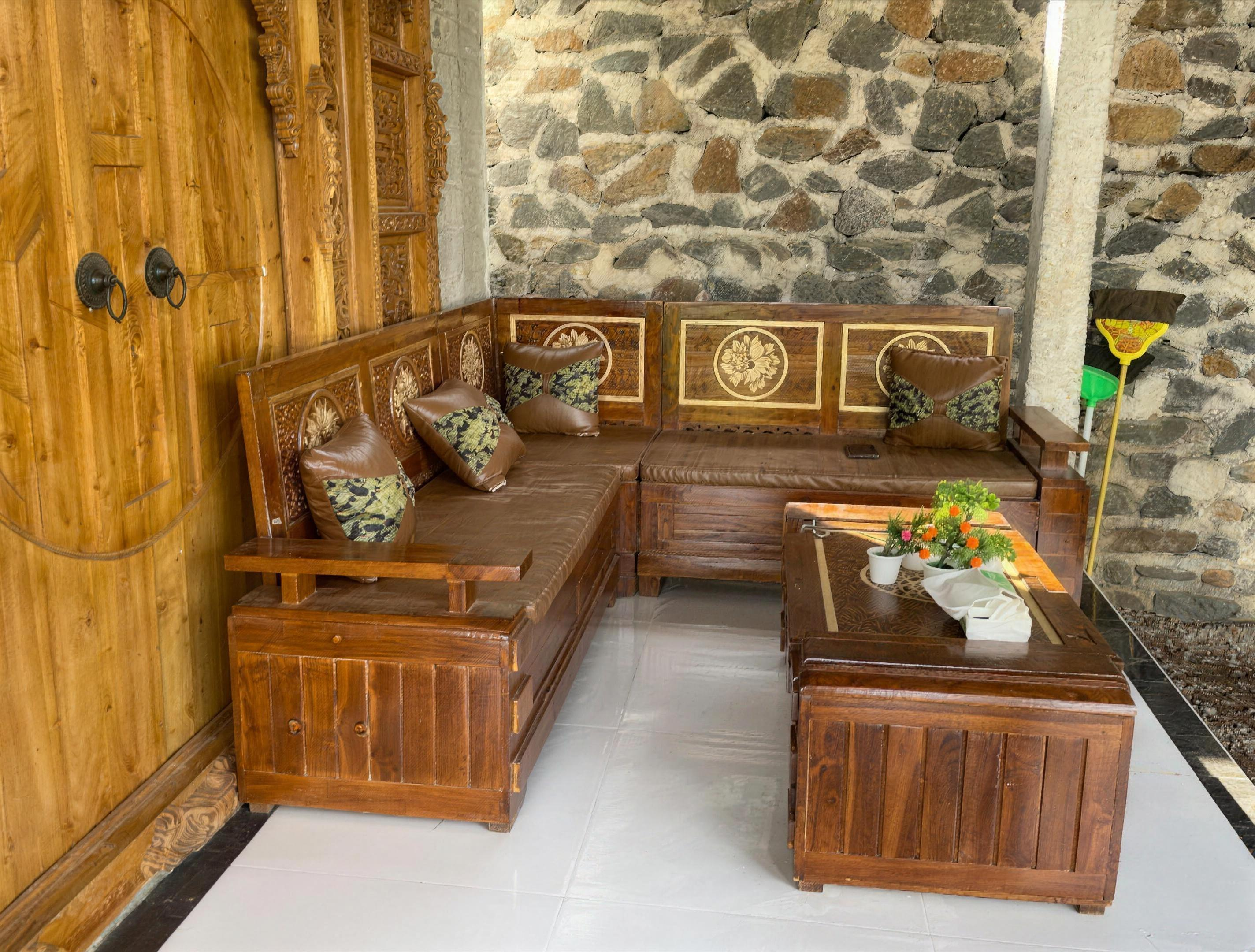 The hand-carved teak lounge