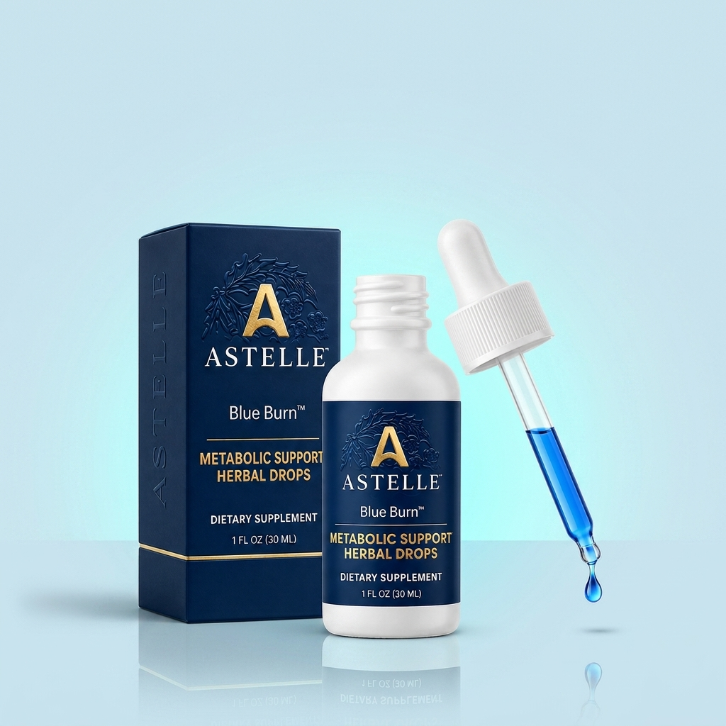 Astelle Blue Burn Metabolic Support Herbal Drops white bottle with navy label and gold A emblem, navy product box and white-capped dropper on a soft ice-blue background