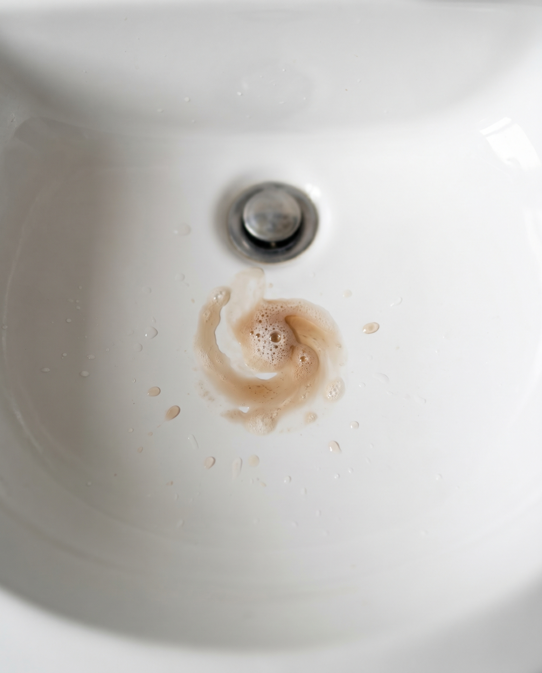 Residue in a sink after a rinse