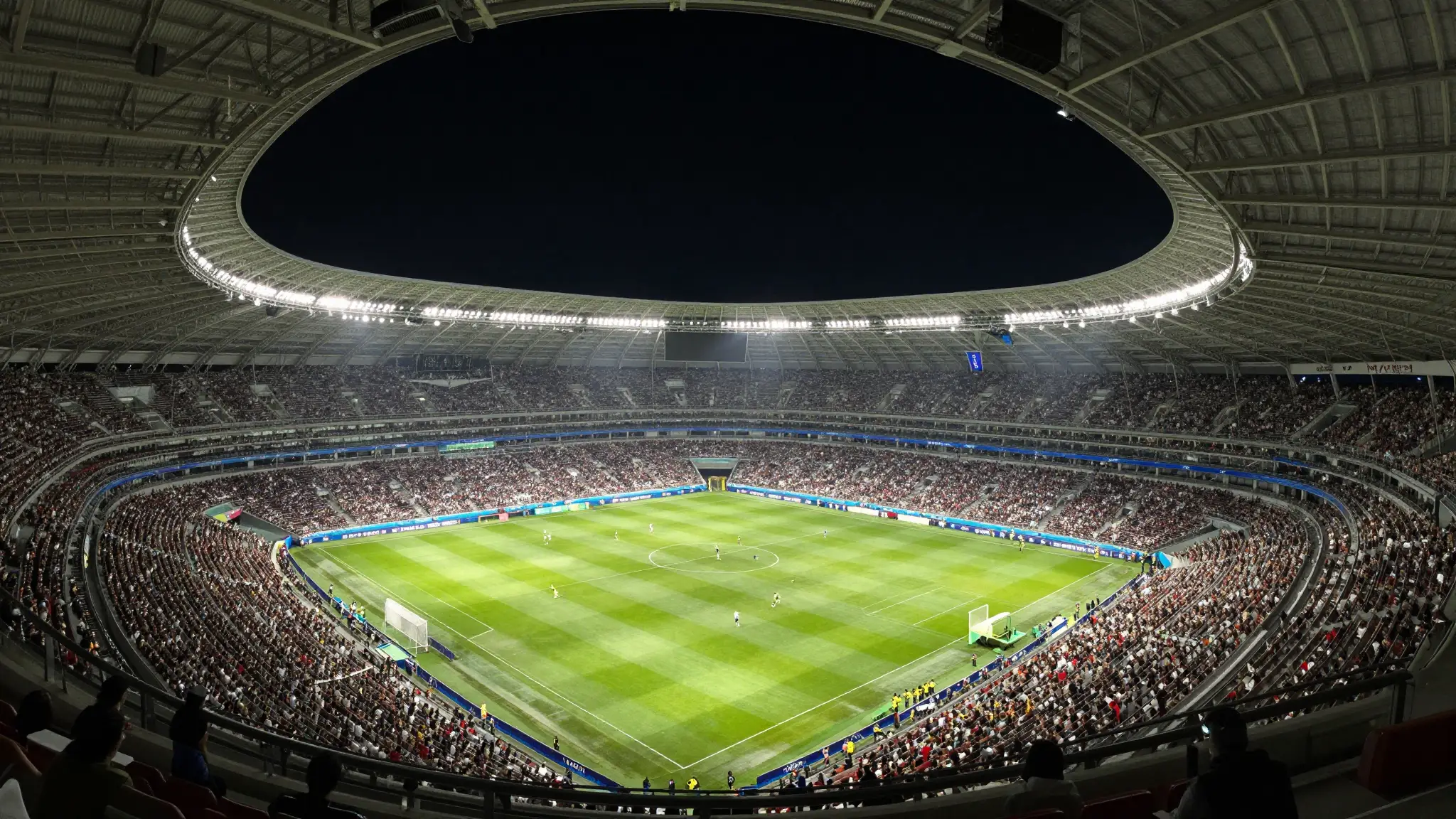 Packed stadium bowl at night