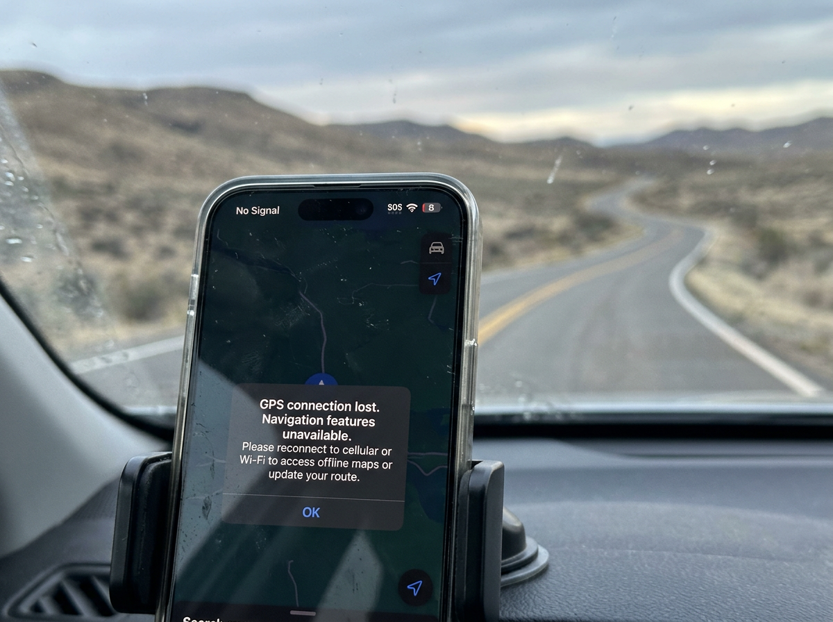 Phone showing no signal, low battery, and a login screen all at once