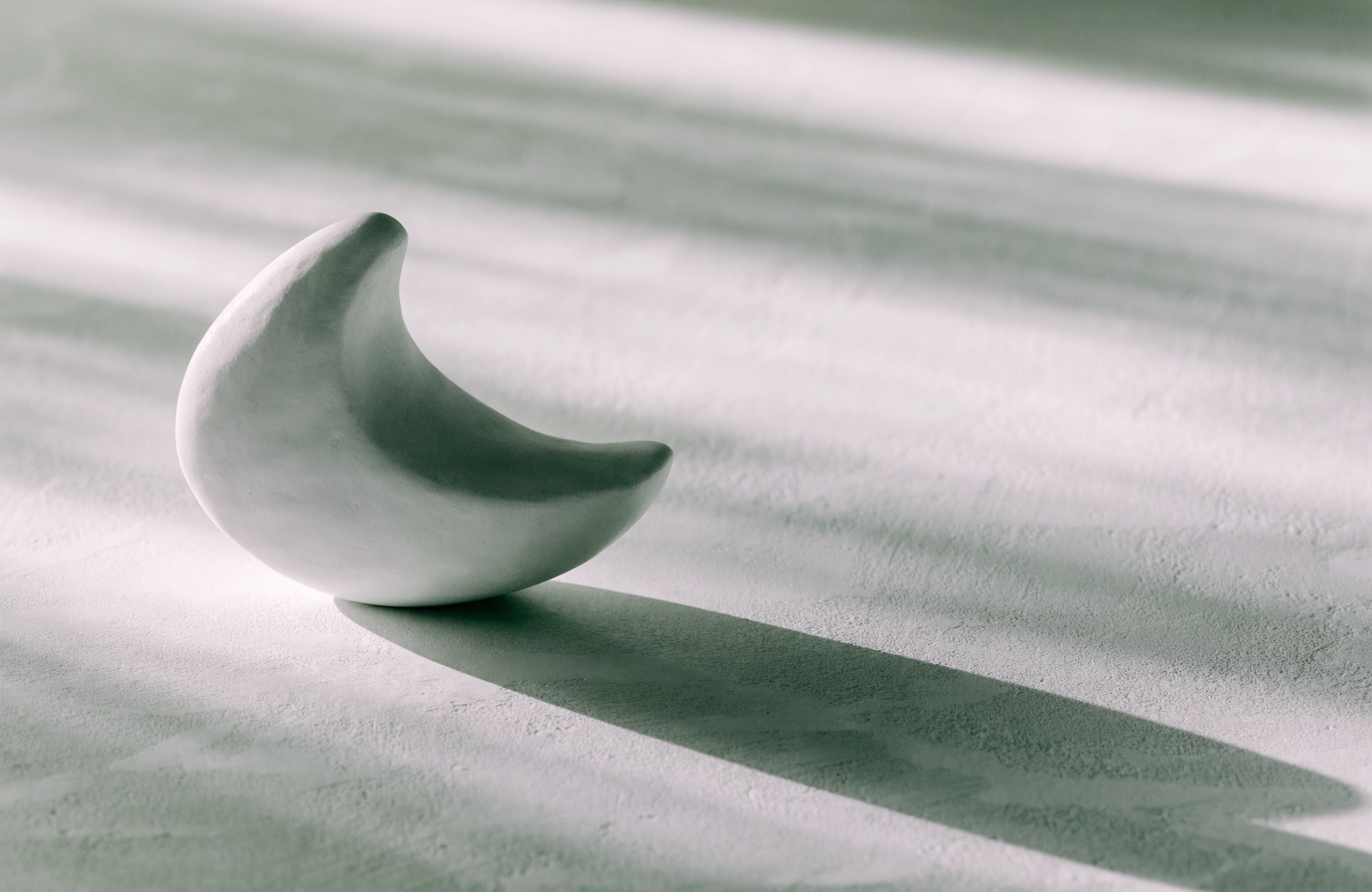 Minimal abstract still life in chalk white and pale sage