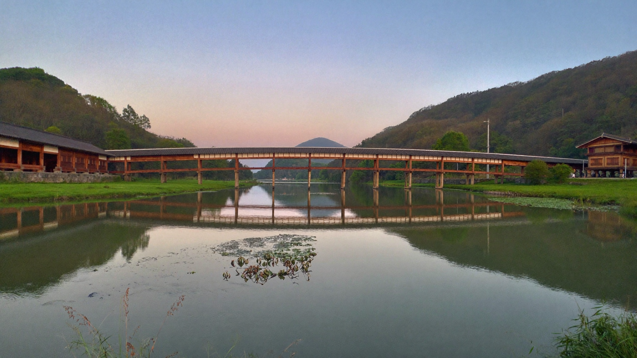 Woryeonggyo wooden bridge Andong Korea at sunset - longest wooden pedestrian bridge in Korea