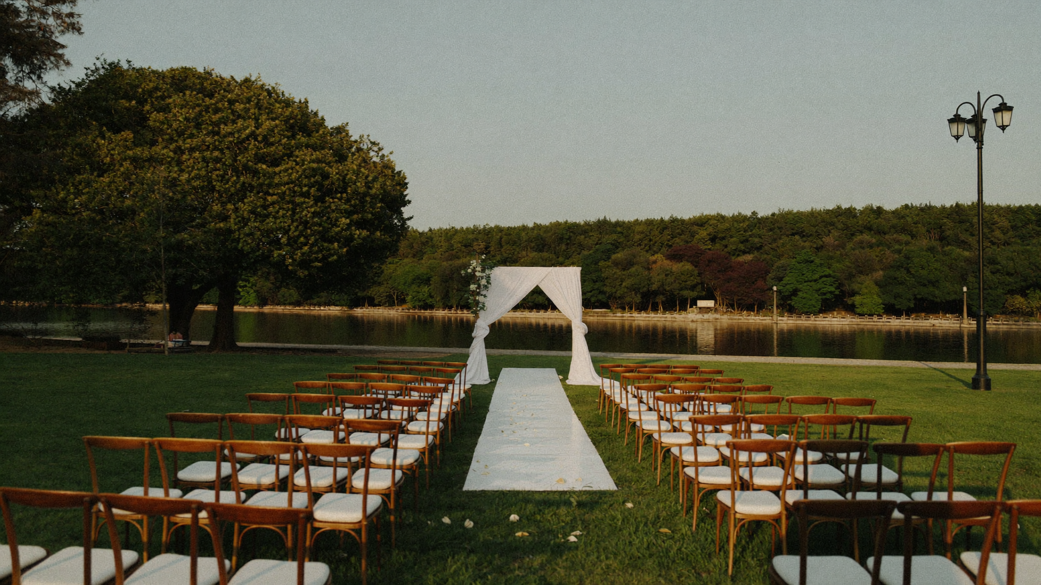 Public wedding garden venue with white arch in a Seoul park, Korea