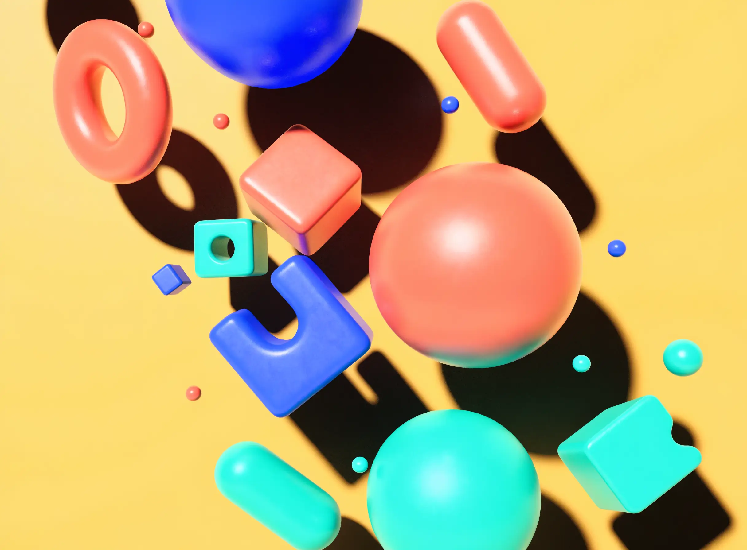 Glossy clay toys tumbling on a sunshine yellow background