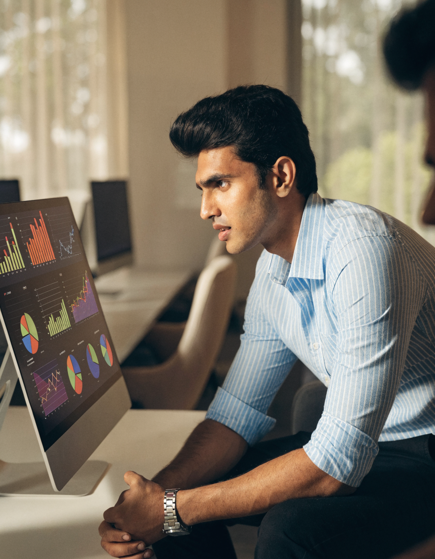 Portrait — marketer reviewing campaign dashboards