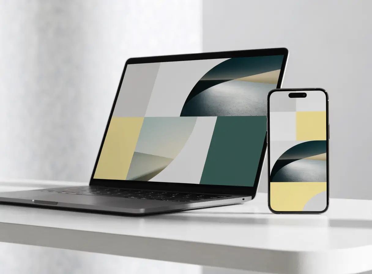 Laptop and phone showing a modern website