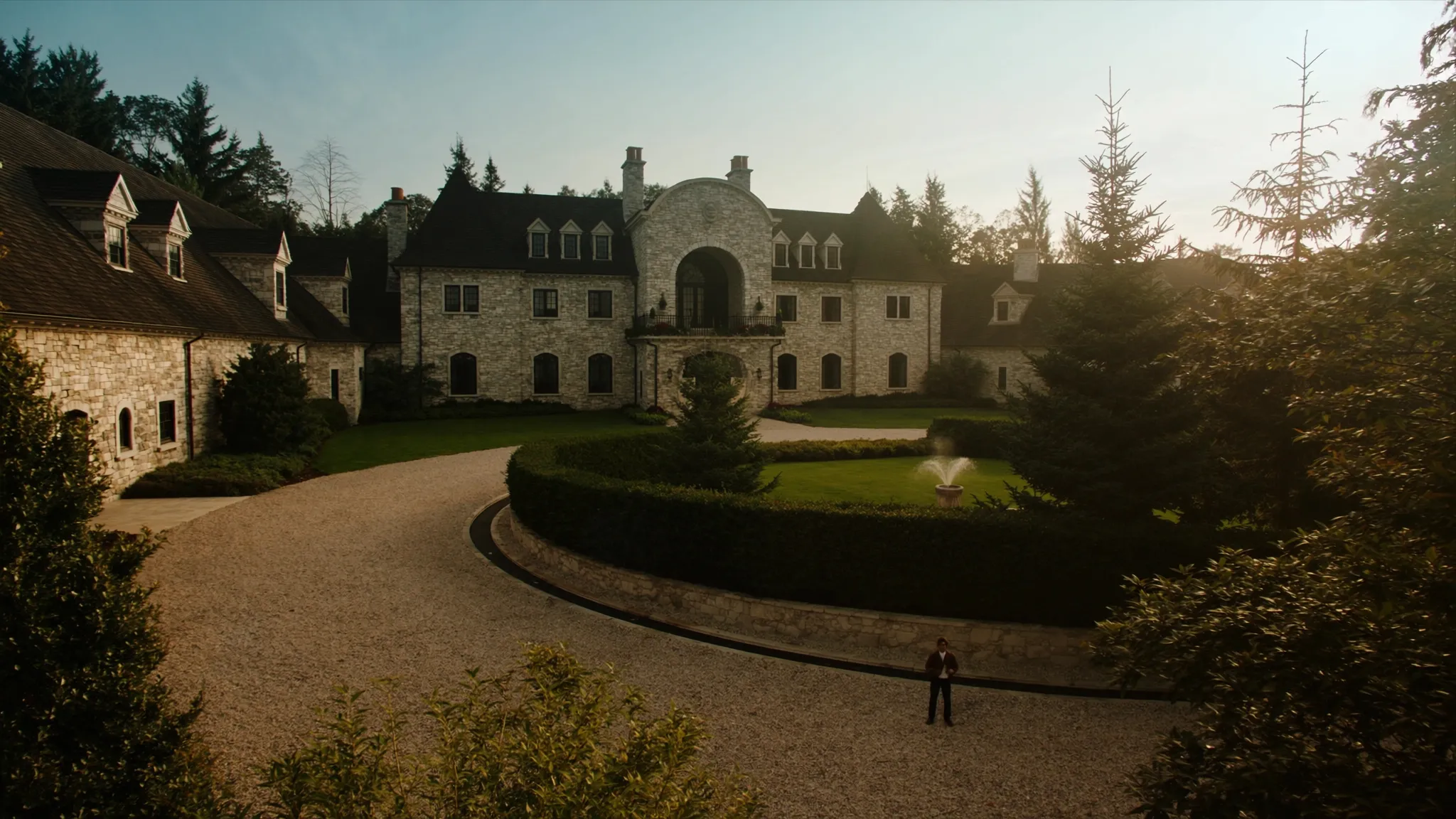 Grand luxury detached stone home with manicured landscaping in Oakville