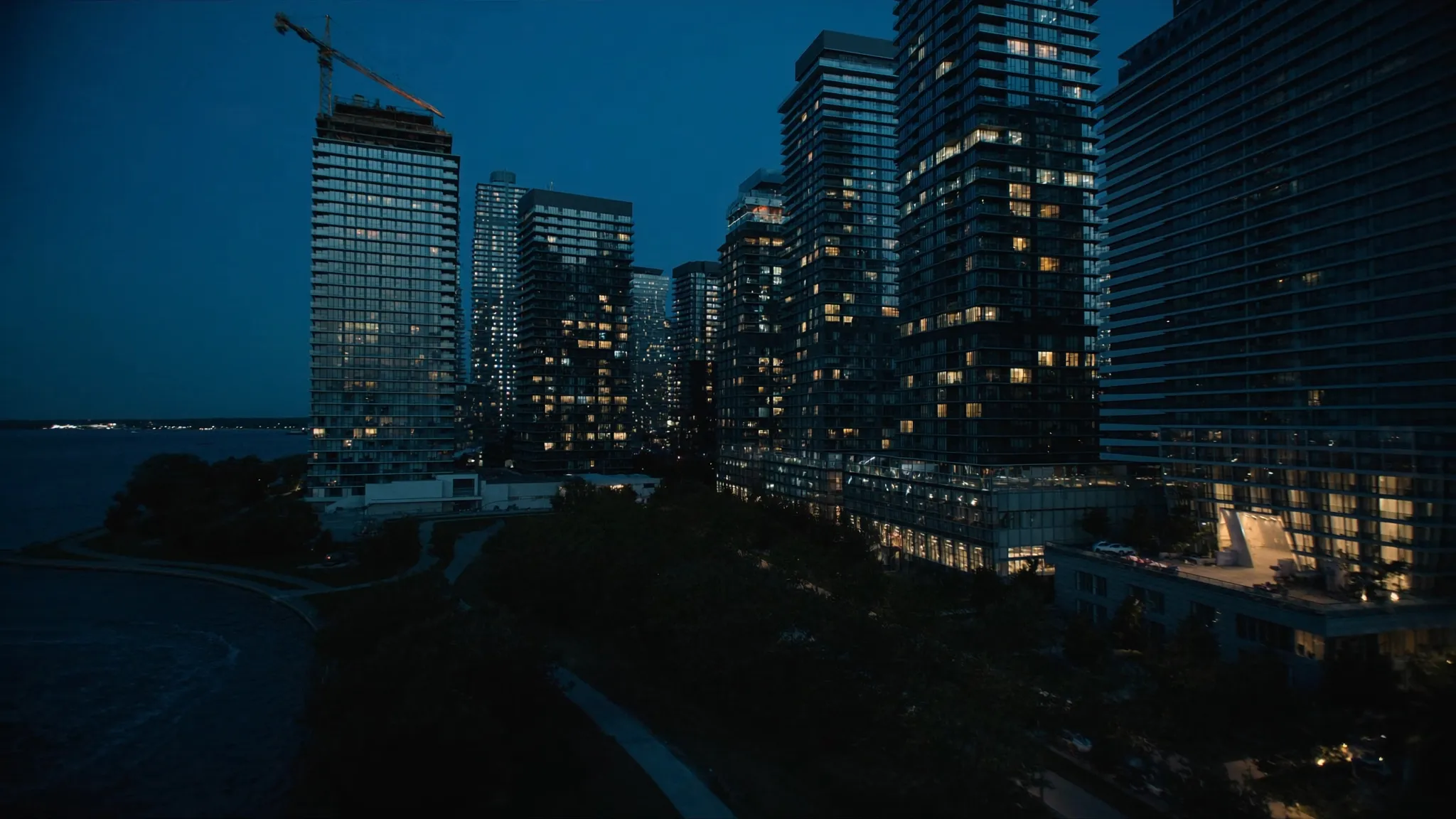 Modern Etobicoke condo towers at blue hour near the lakeshore