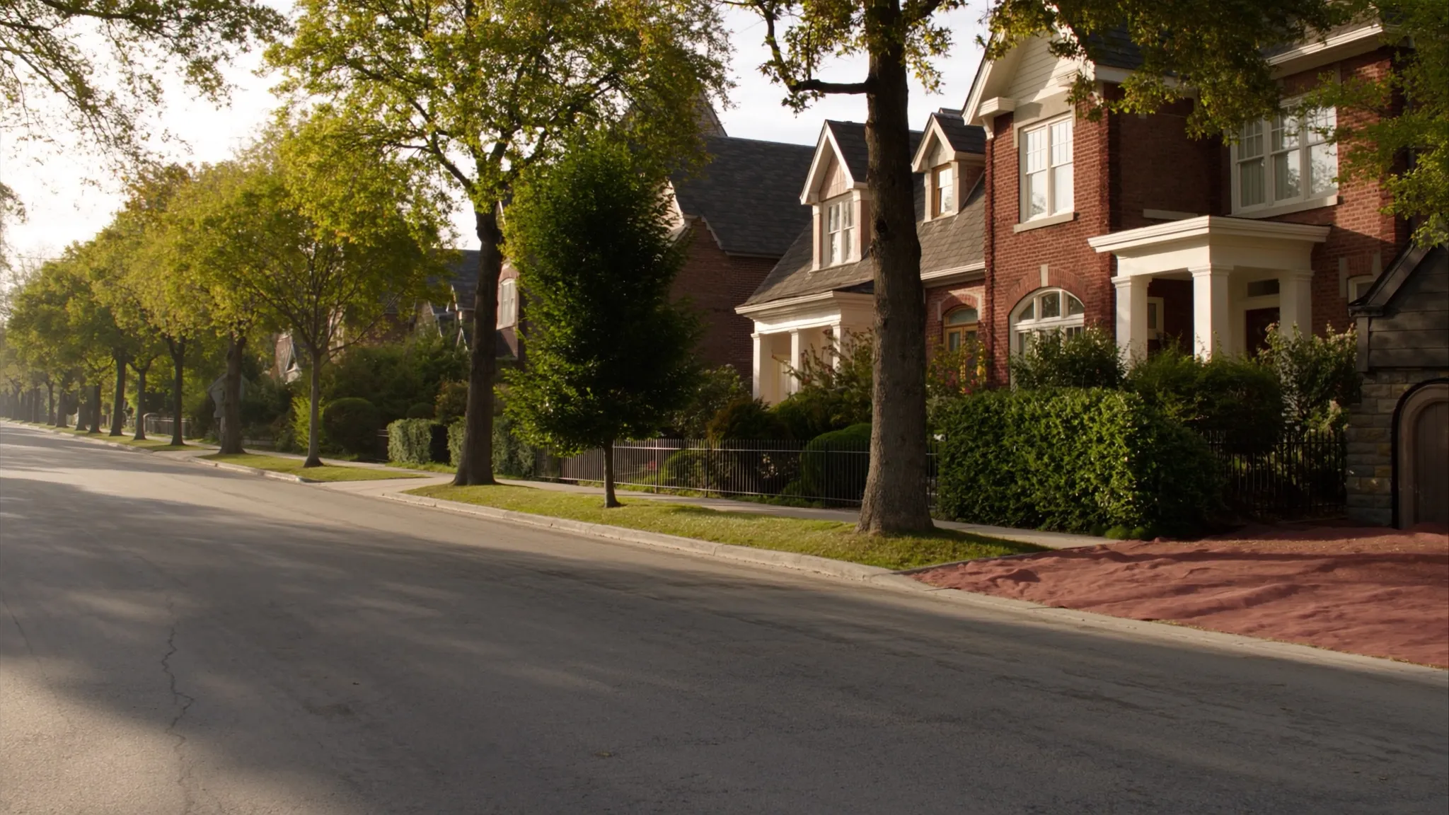 Tree-lined street of classic brick homes in the Kingsway, Etobicoke