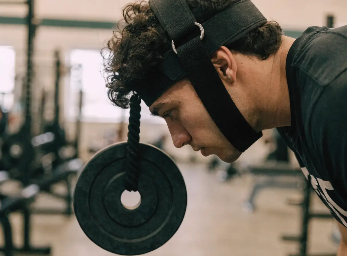 Athlete performing neck exercises