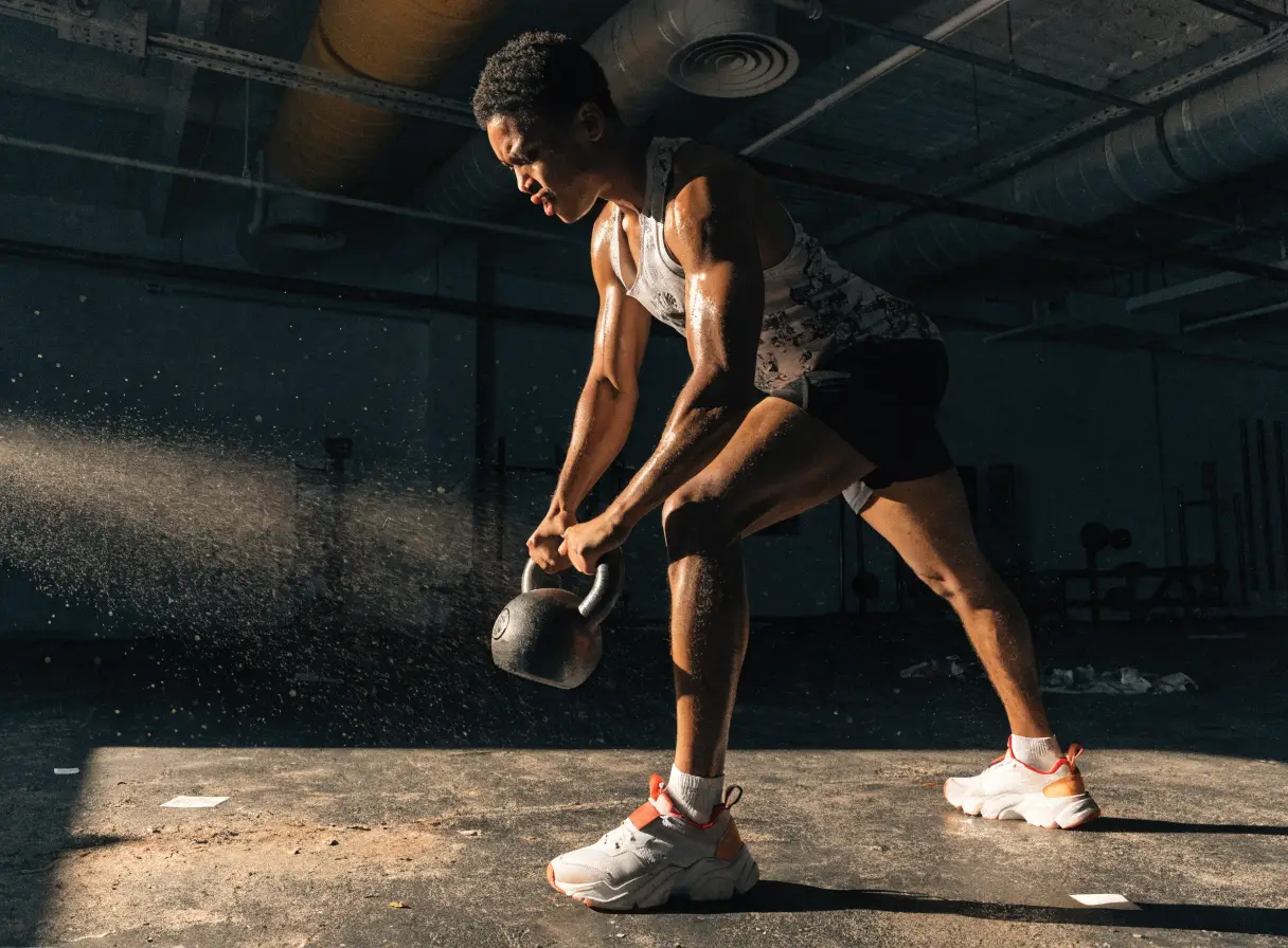 Athlete doing a kettlebell swing
