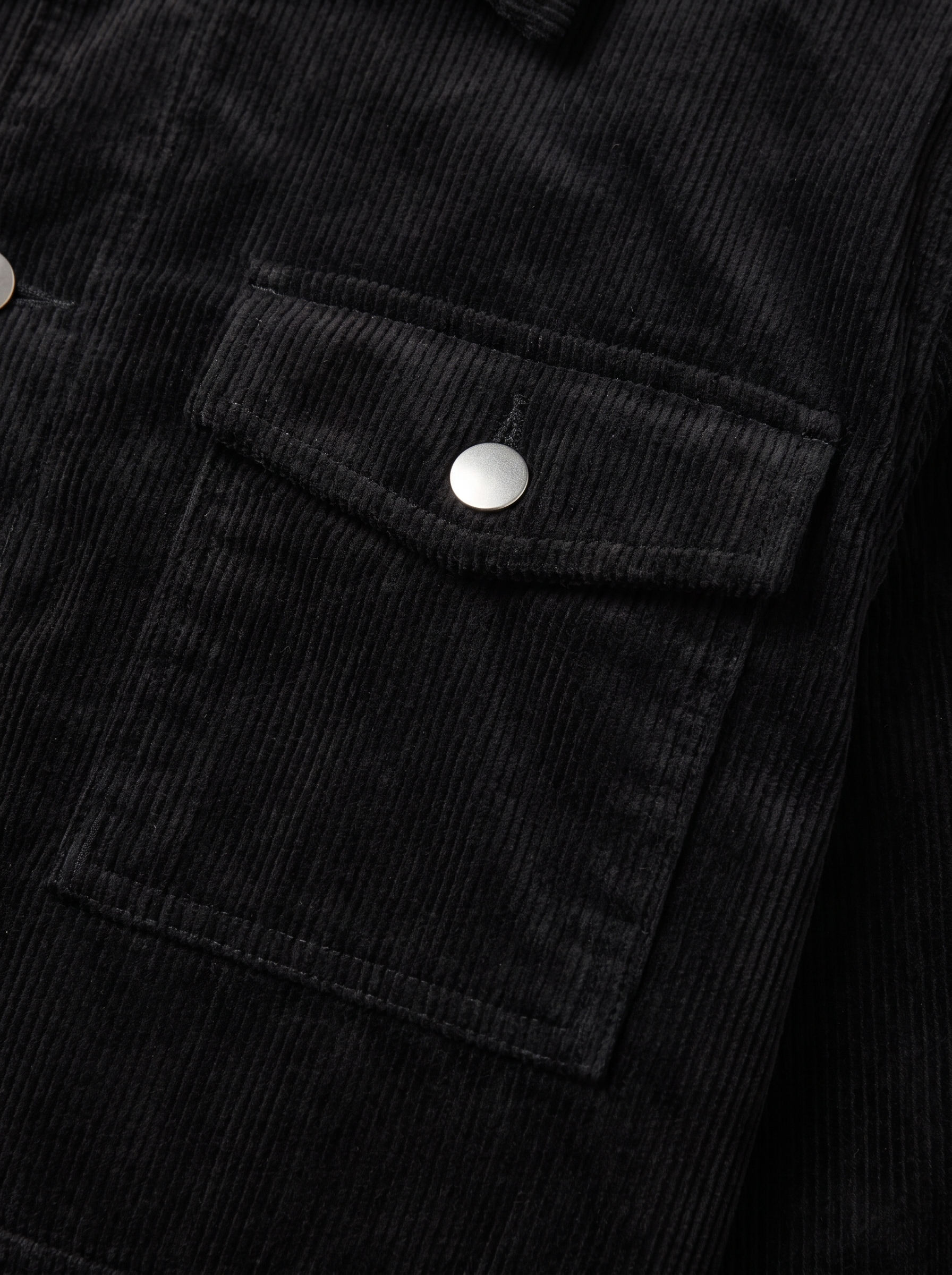 Corduroy cargo jacket flap pocket close up detail