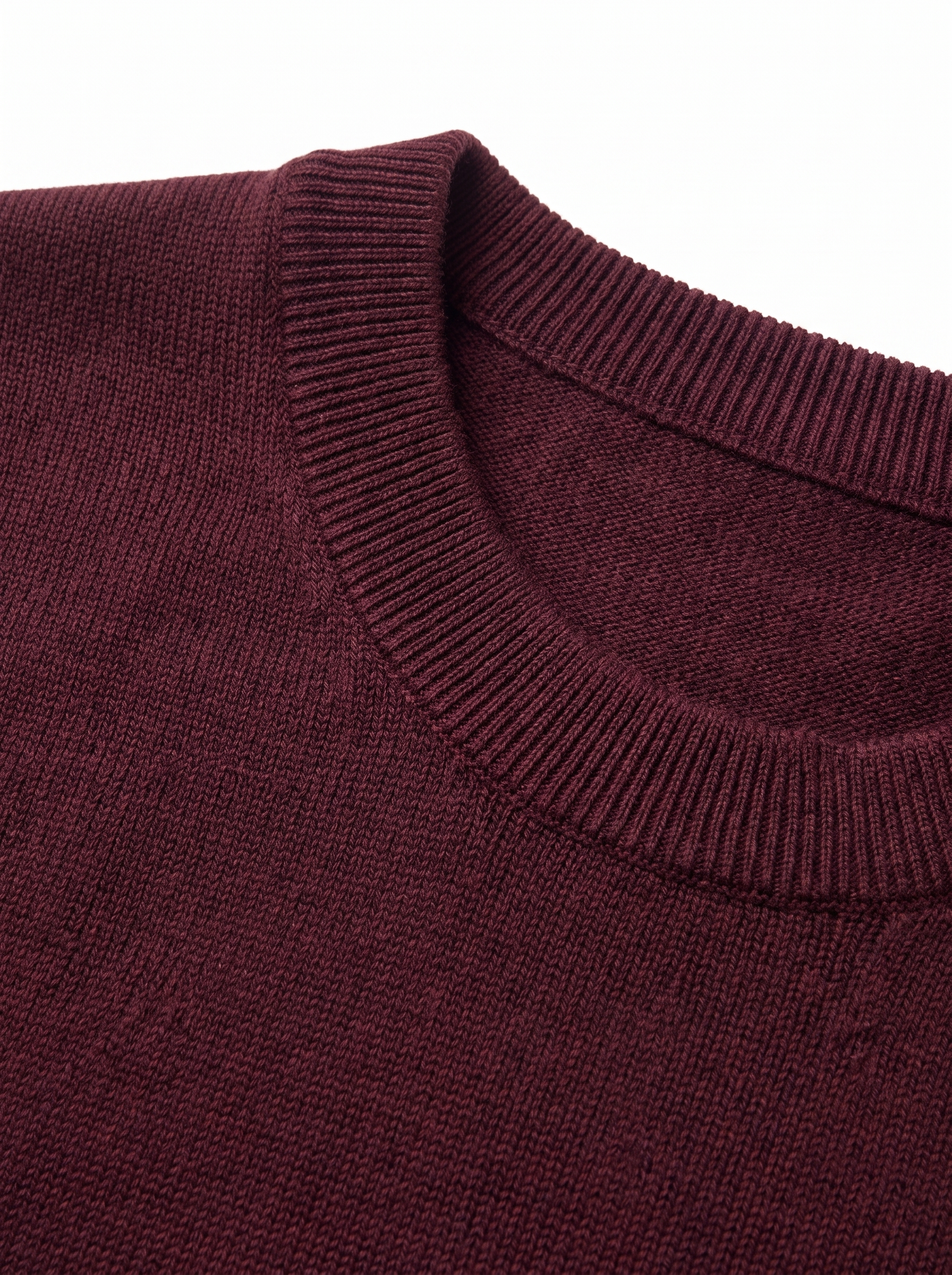 Burgundy crew neck ribbed collar and knit close up detail