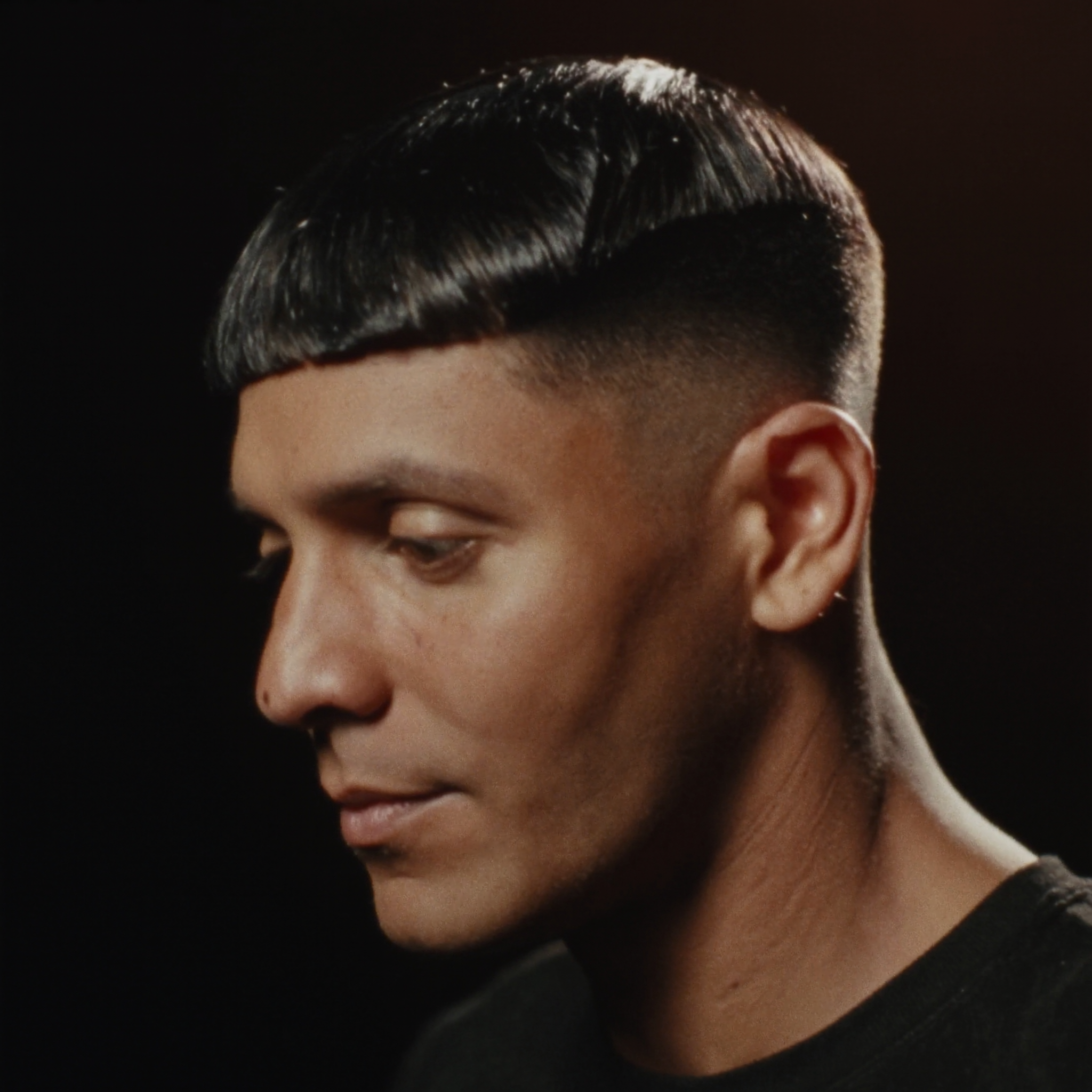 Marcus's work — a textured crop with a tight fade