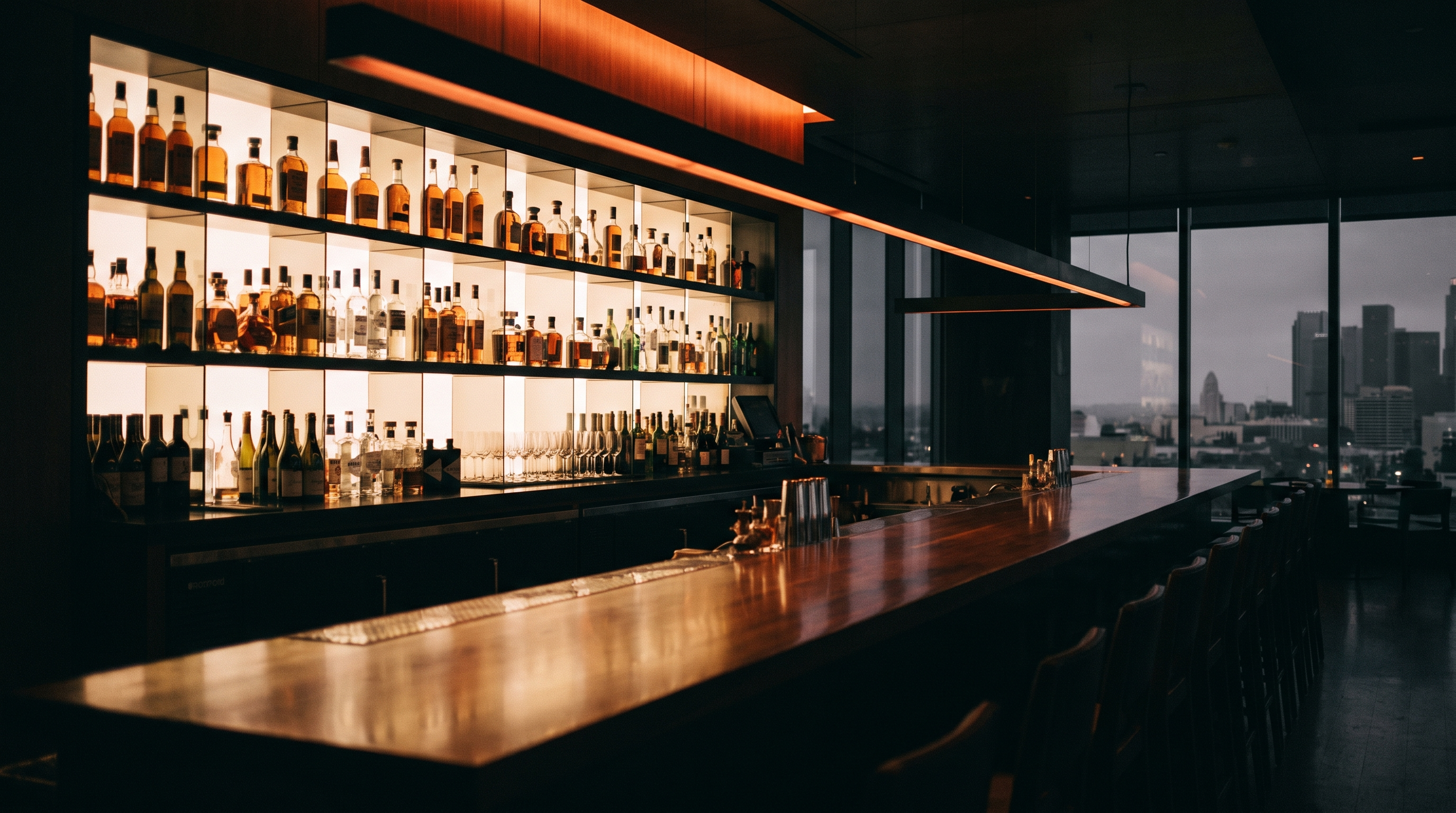 Web design for a Los Angeles restaurant capturing a bar area glowing at dusk