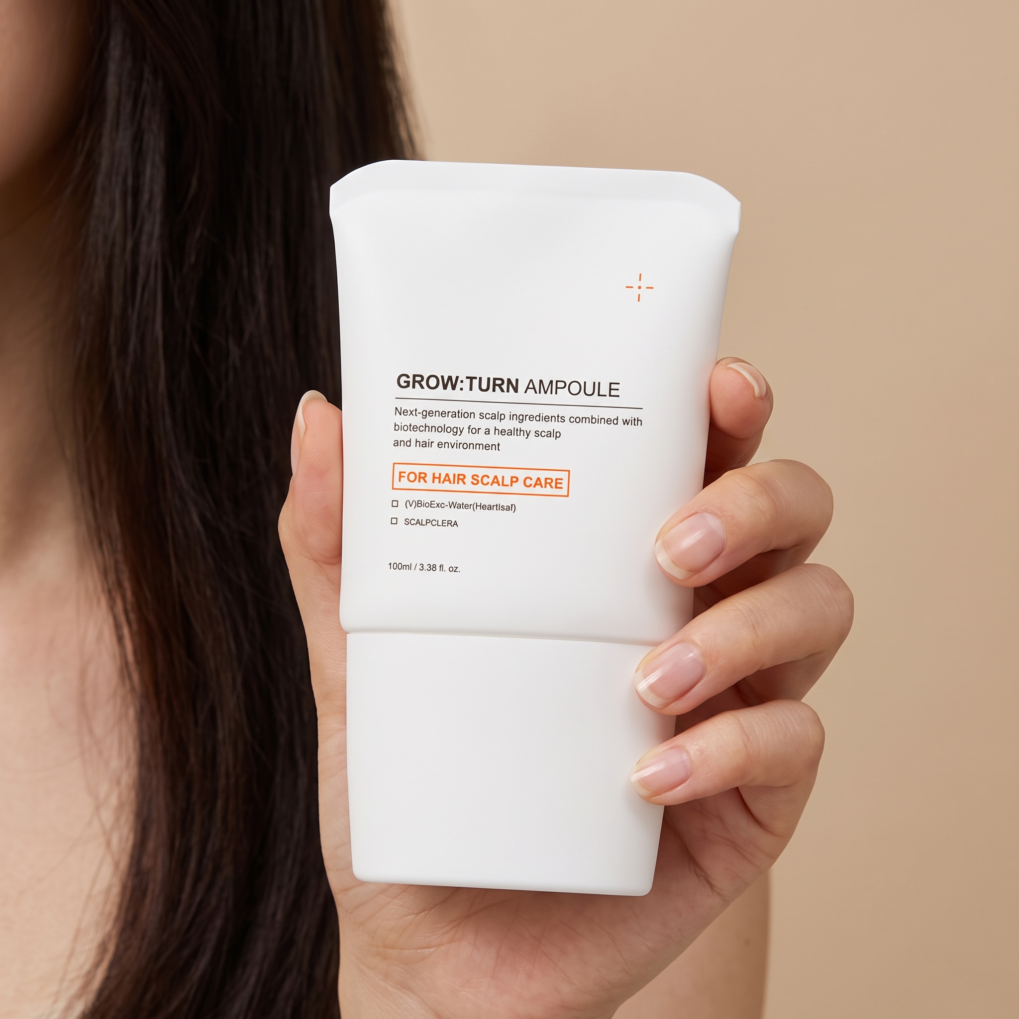 Hair Growth Scalp Serum held in hand