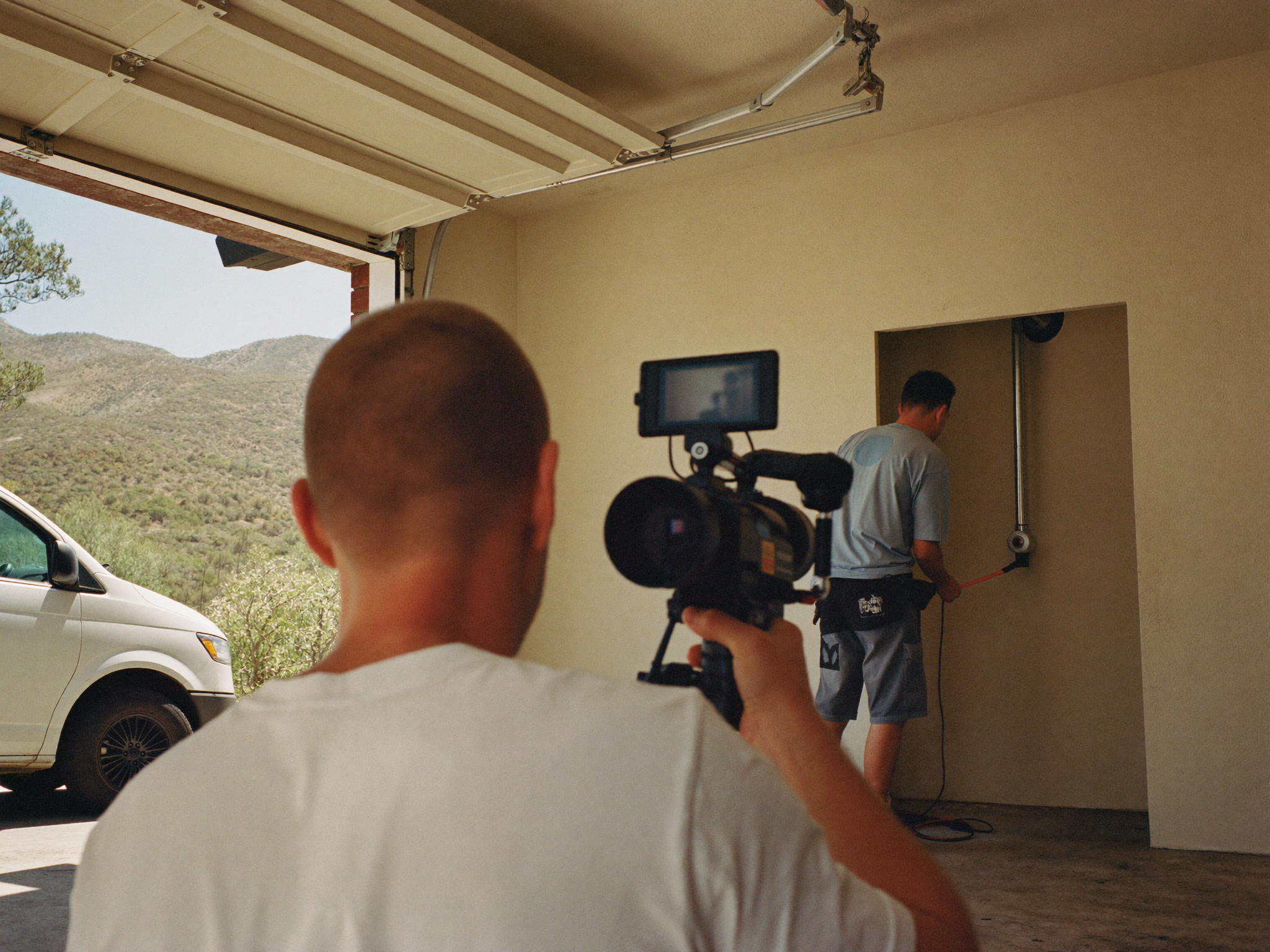Our camera operator filming a plumber on a job