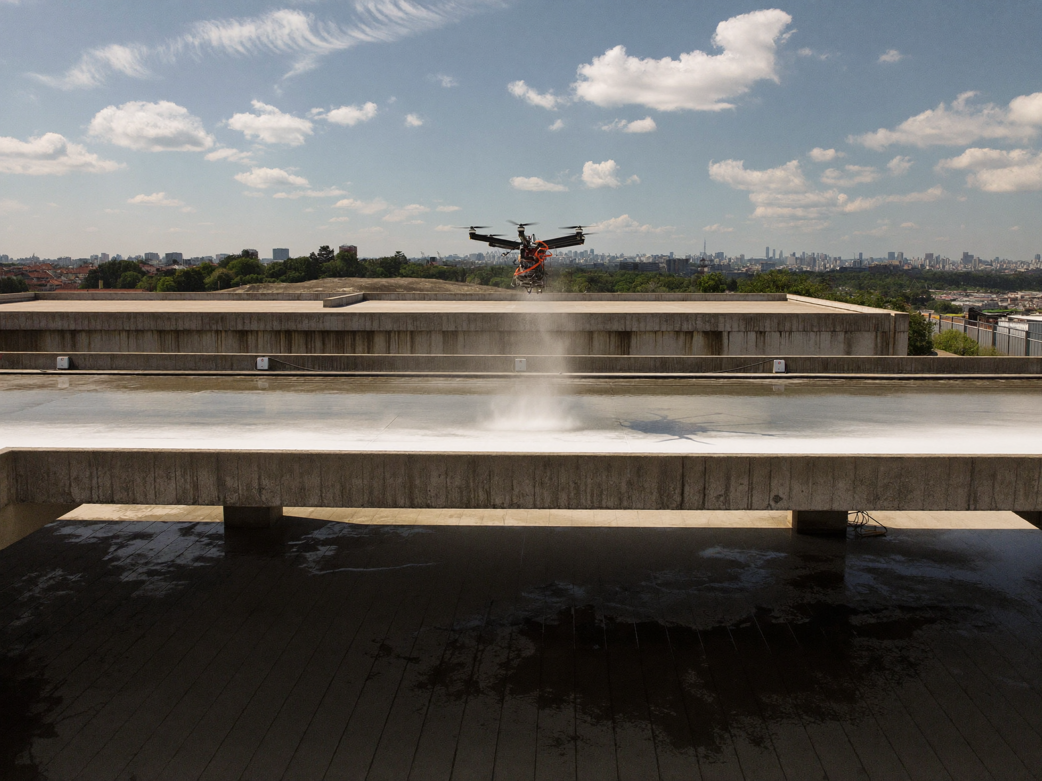 Drone exterior cleaning: Parking structure deck, before the full pass