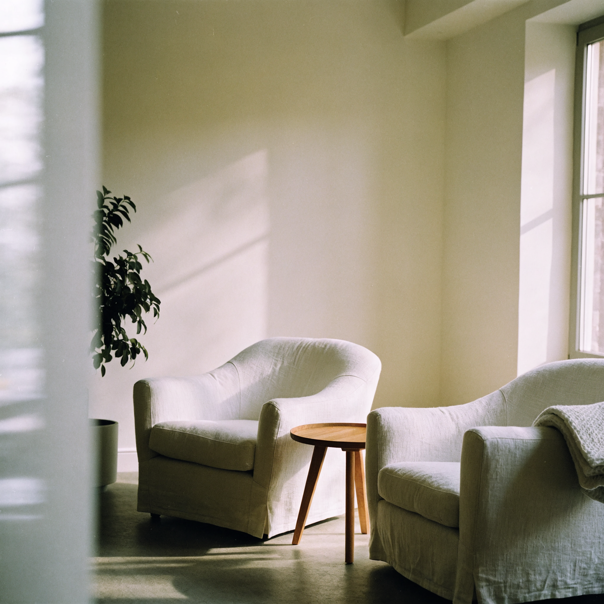 Two empty armchairs in a quiet consultation room