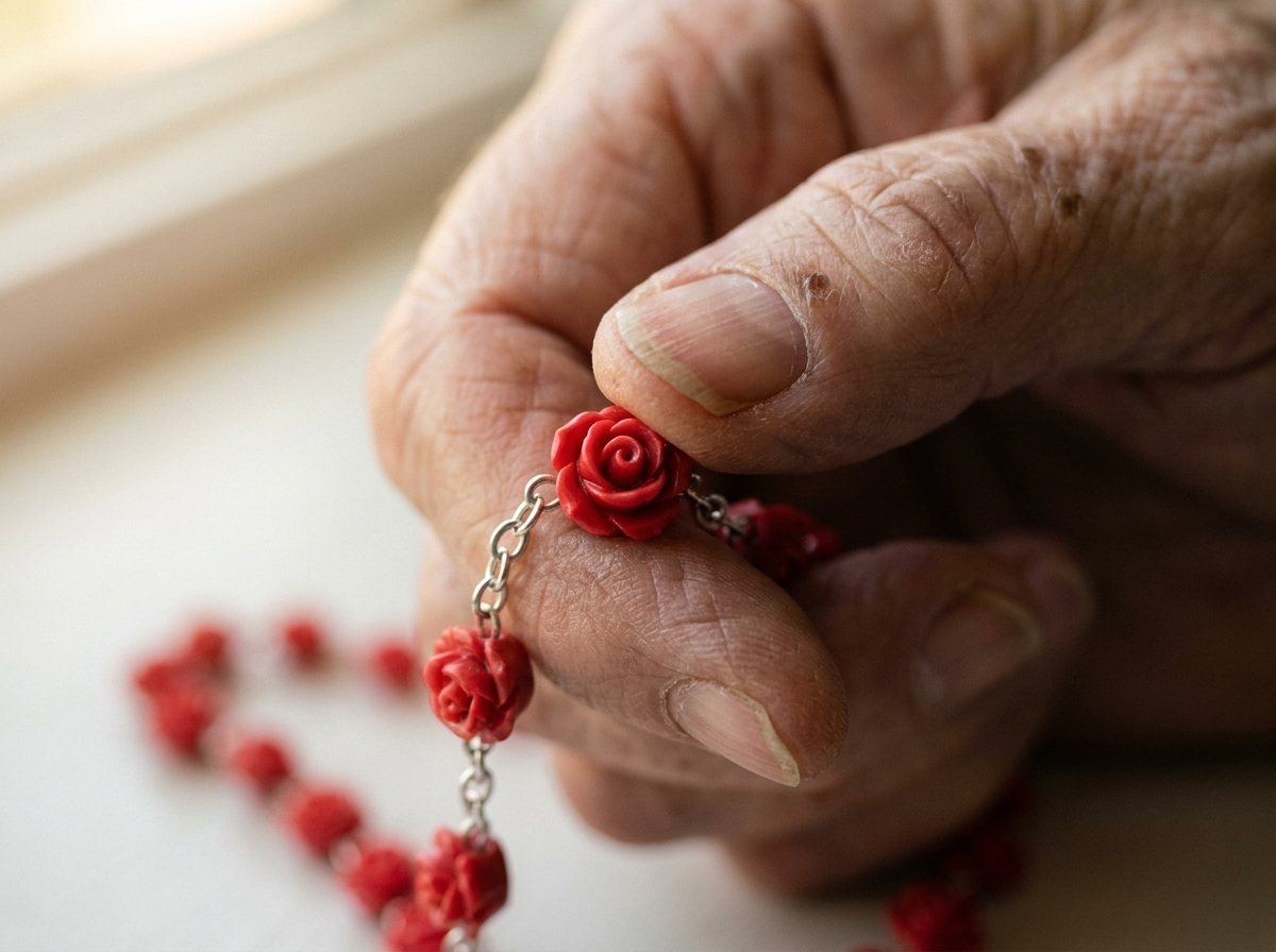 A single sculpted rose bead