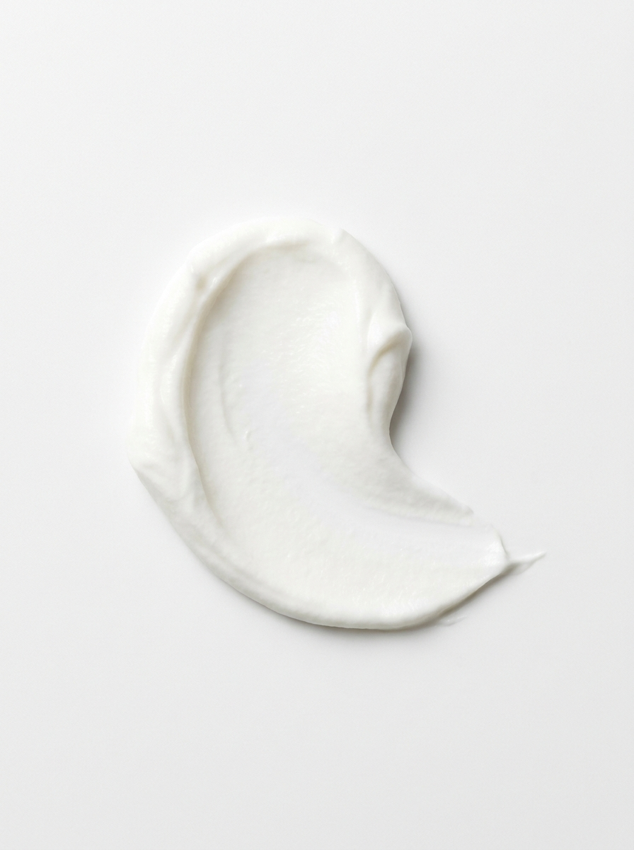 Mineral sunscreen swatch — opaque white cream