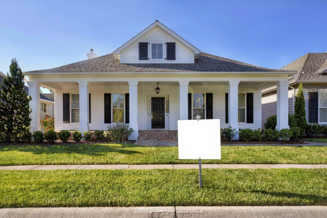 Attractive Southern home with a for rent sign in the front yard