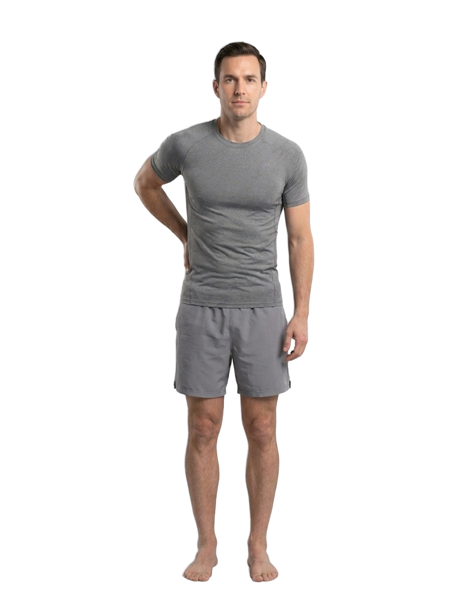 A person demonstrating a natural standing posture, used to illustrate condition-specific focus areas