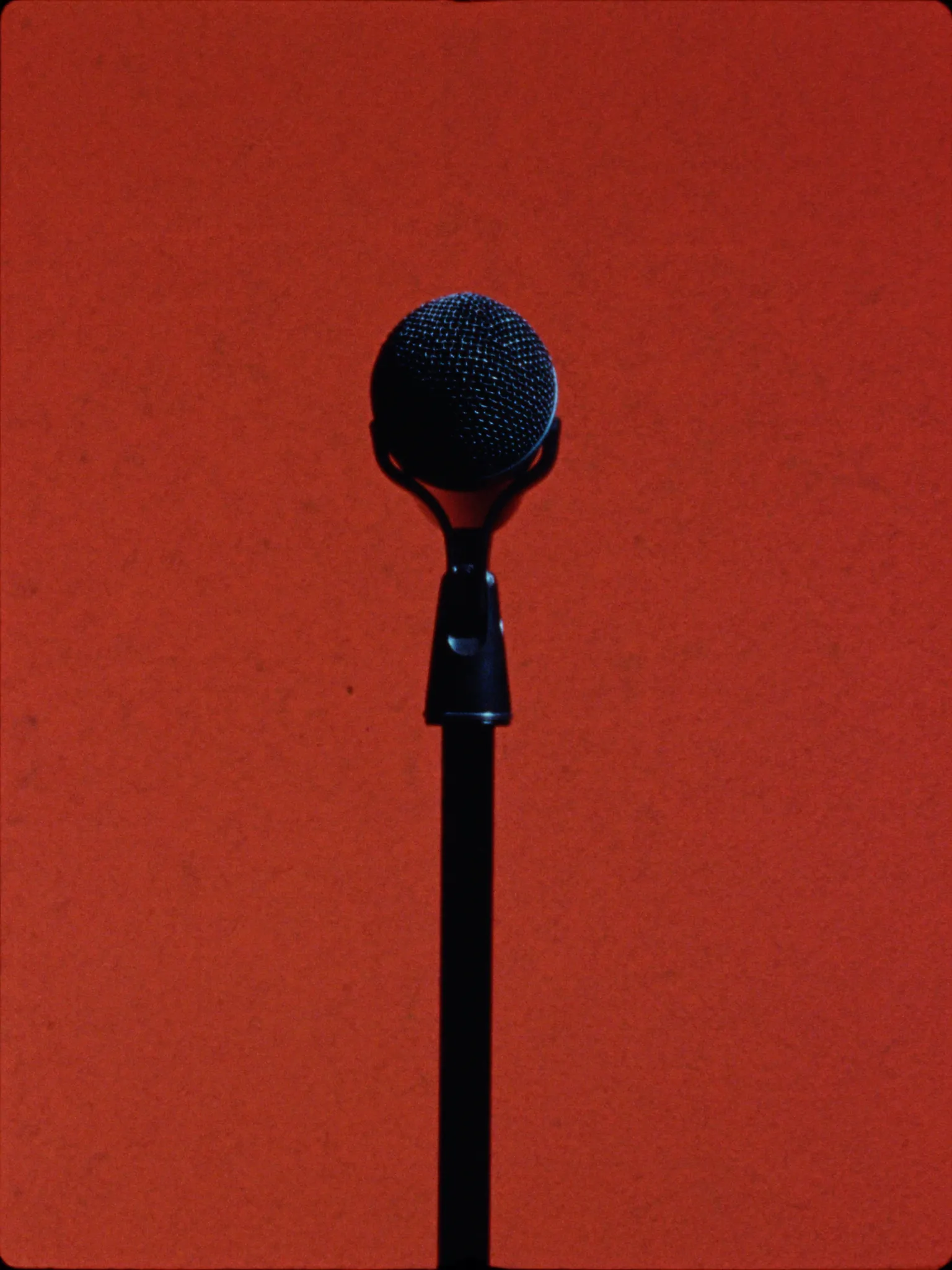 Microphone against terracotta backdrop