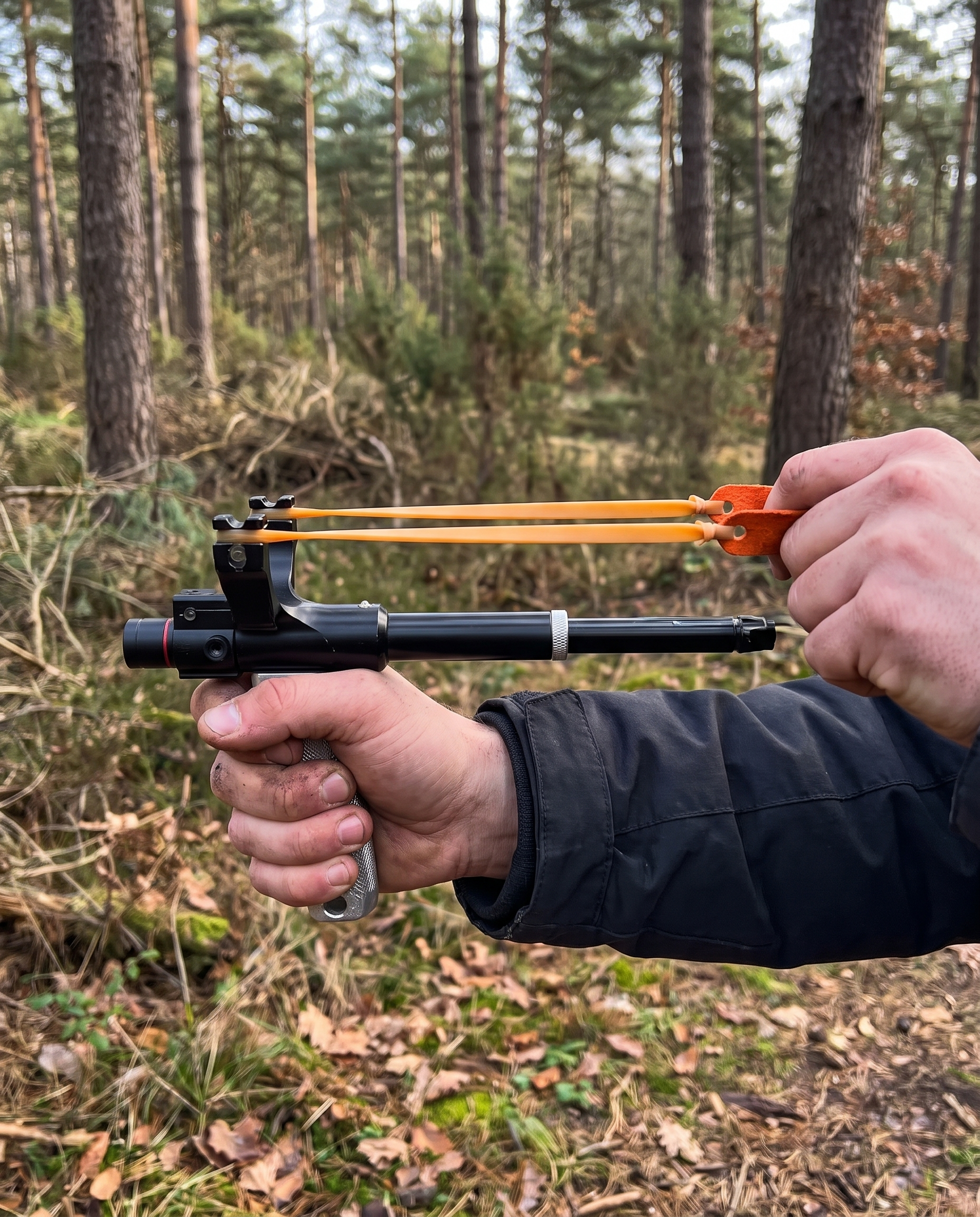 Telescopische Katapult met Laservisier in gebruik