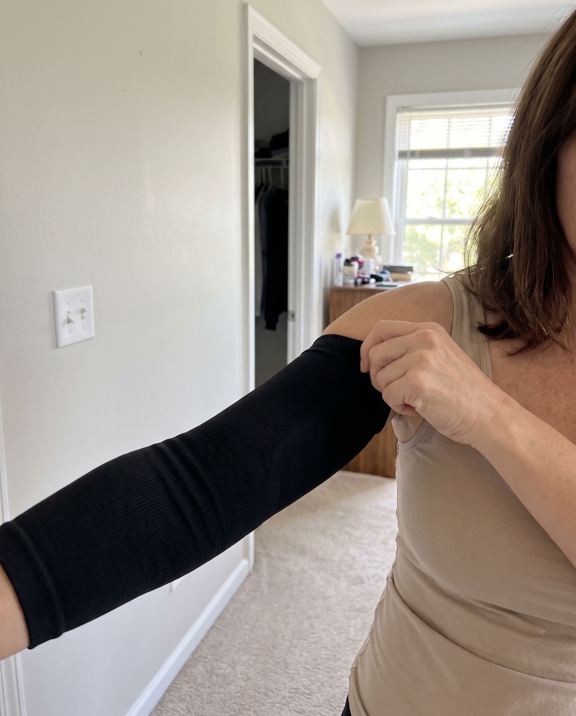 Compression Arm Sleeves with Posture Support for Women in use