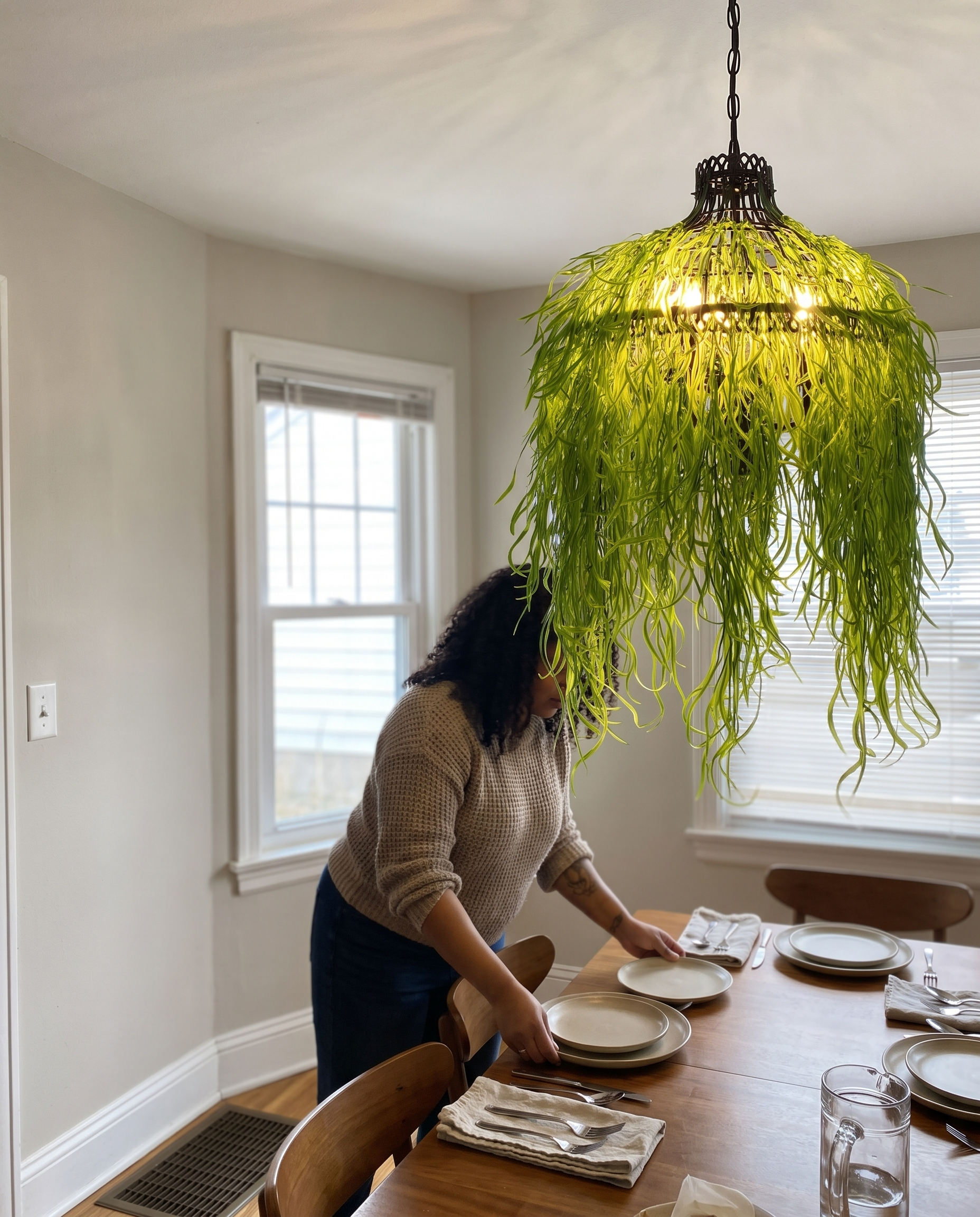 3-Light Hanging Fixture with Faux Foliage Iron Frame Pendant in use