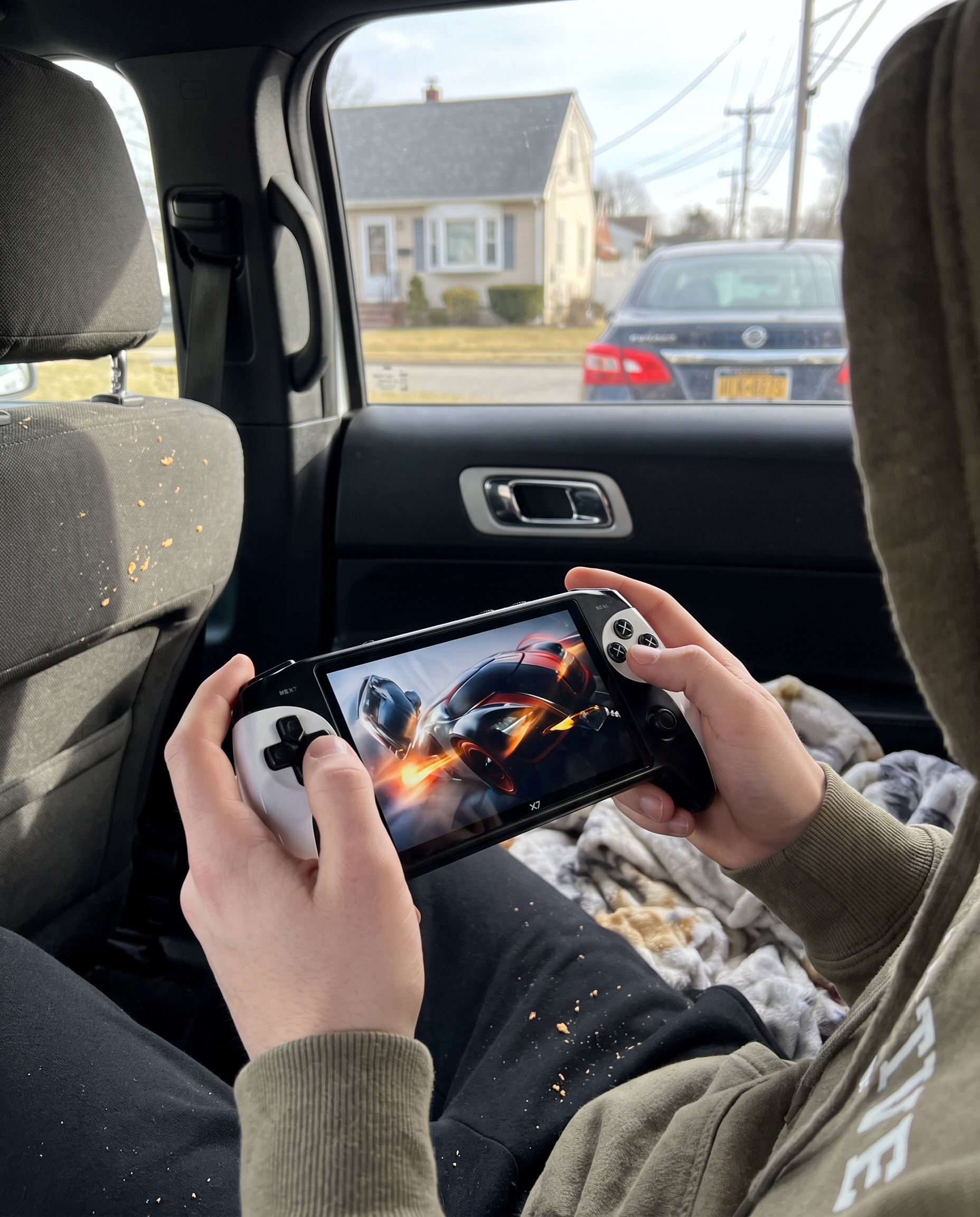 Portable Gaming Device with 10,000 Built-In Games in use
