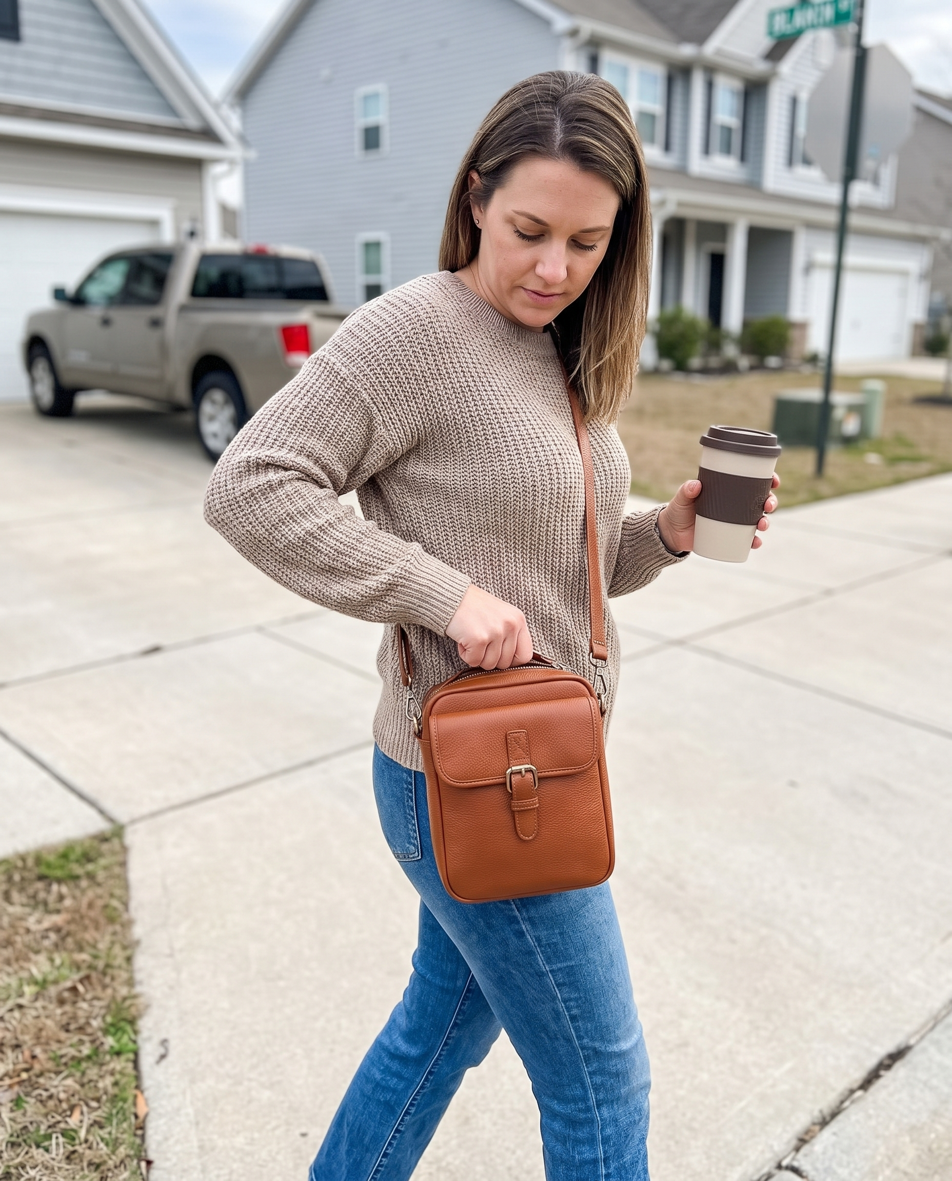 Square Leather Crossbody Purse with Secure Zipper Closure in use