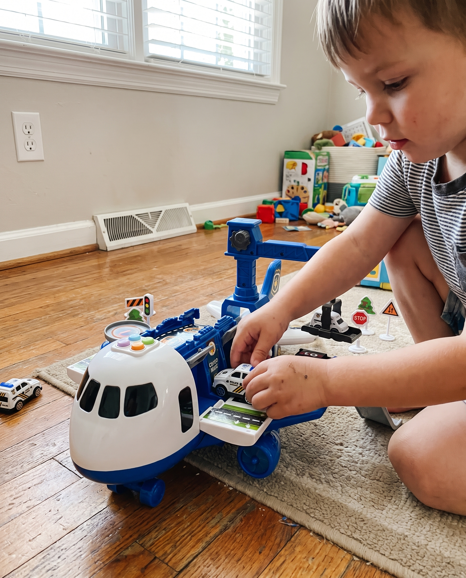 Interactive Cargo Plane Toy Set with Vehicles & Accessories for Kids Ages 3-6 in use