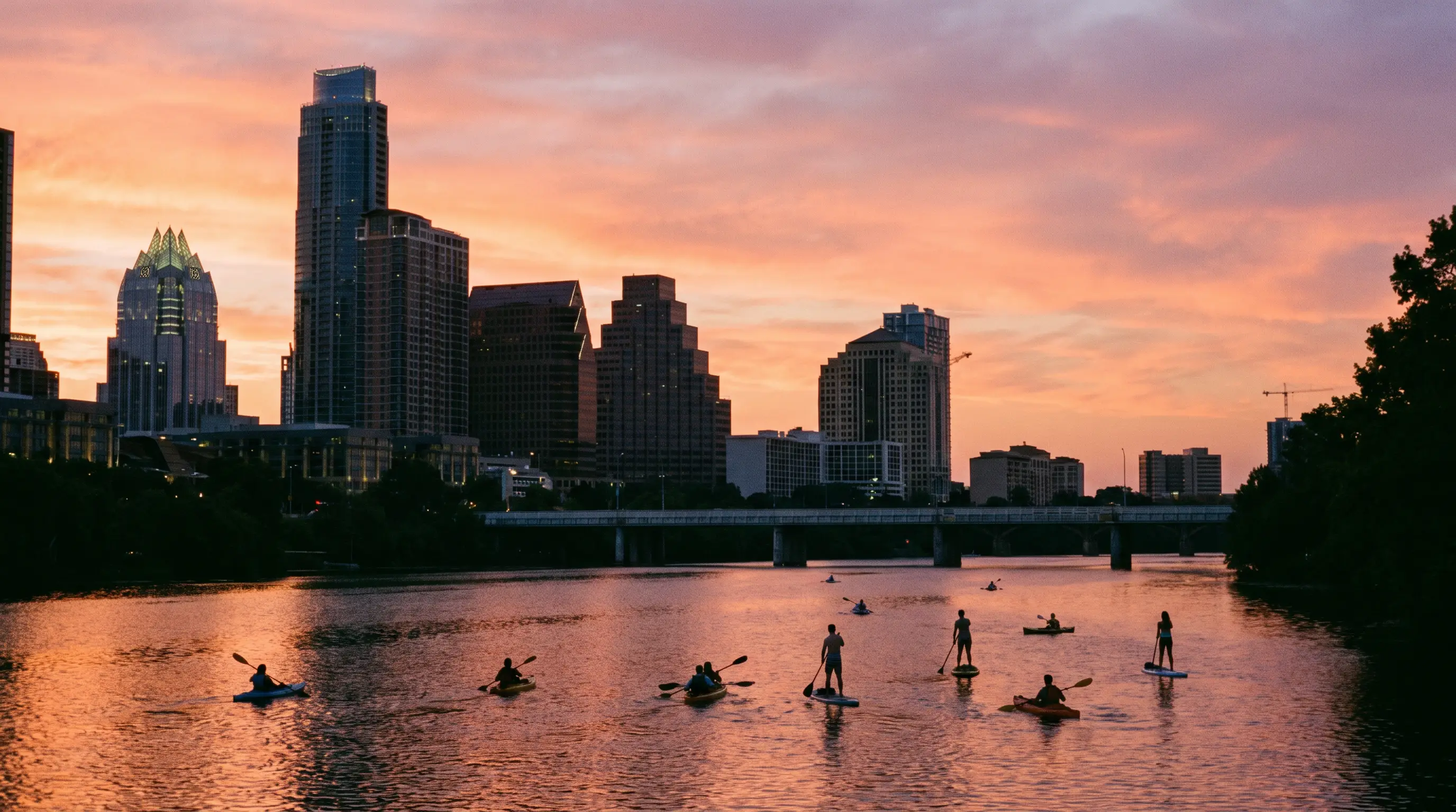 Austin skyline at sunset across the lake