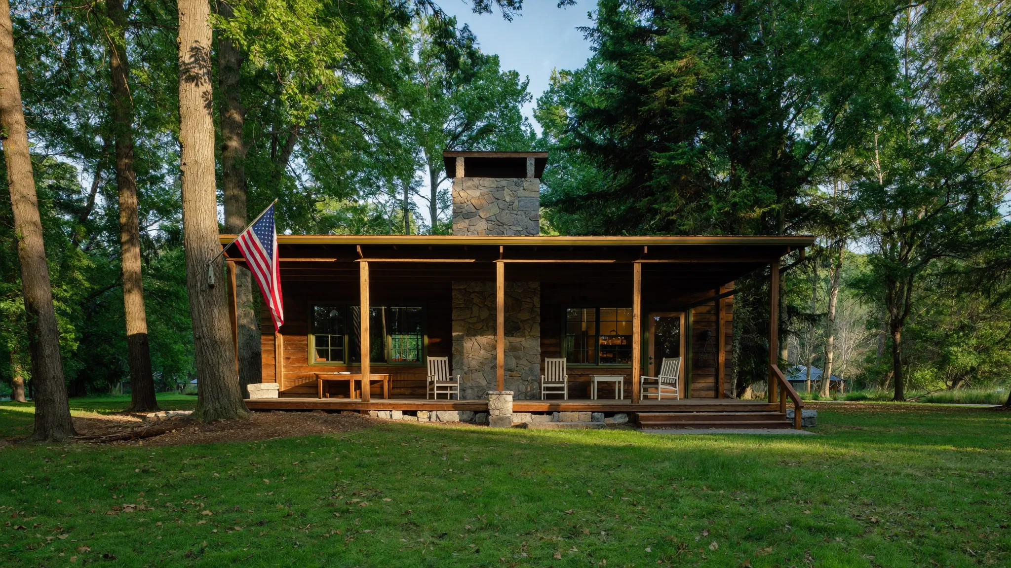 A hunting club camp among tall Pennsylvania hardwoods