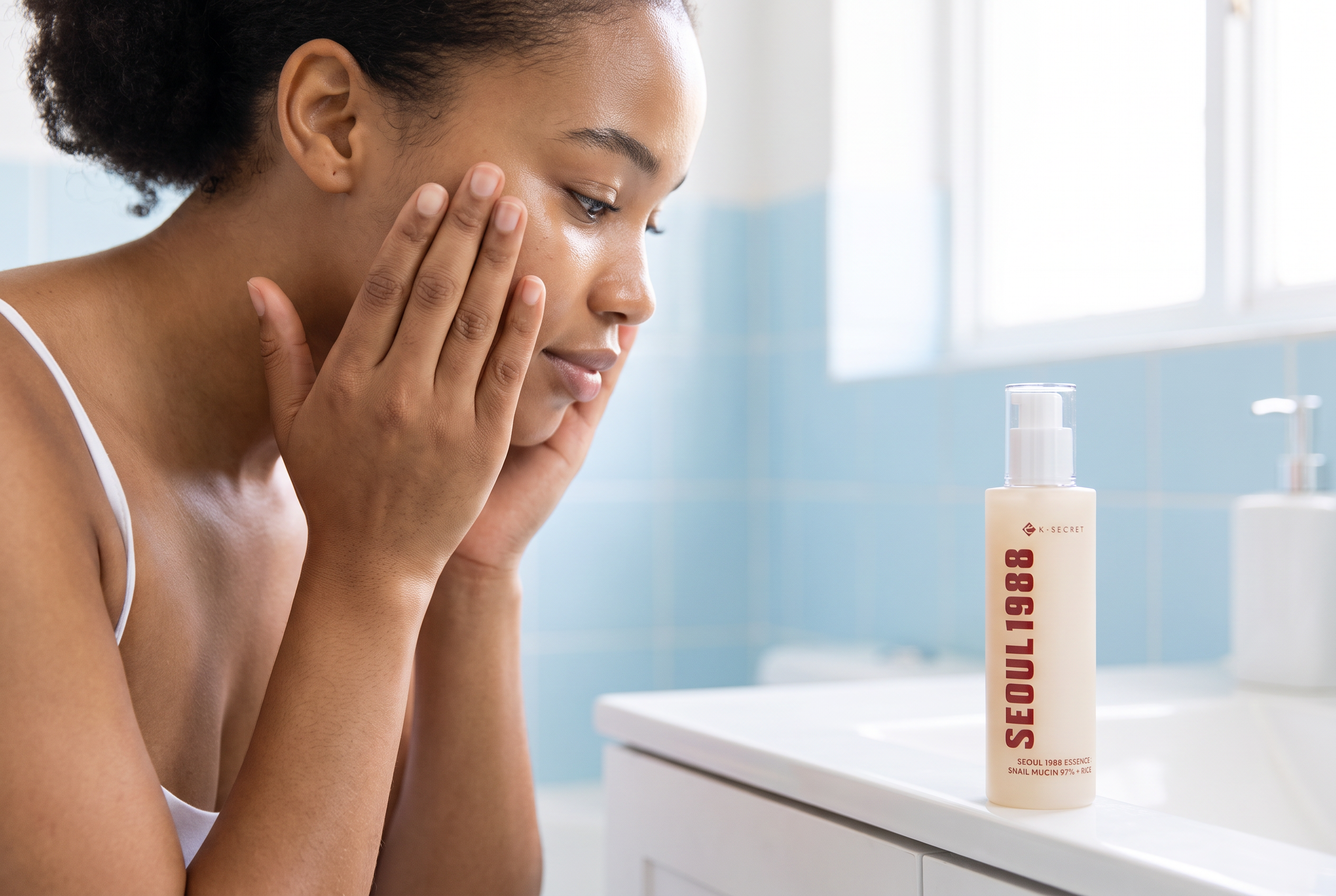 Woman pressing Seoul 1988 essence into balanced normal skin