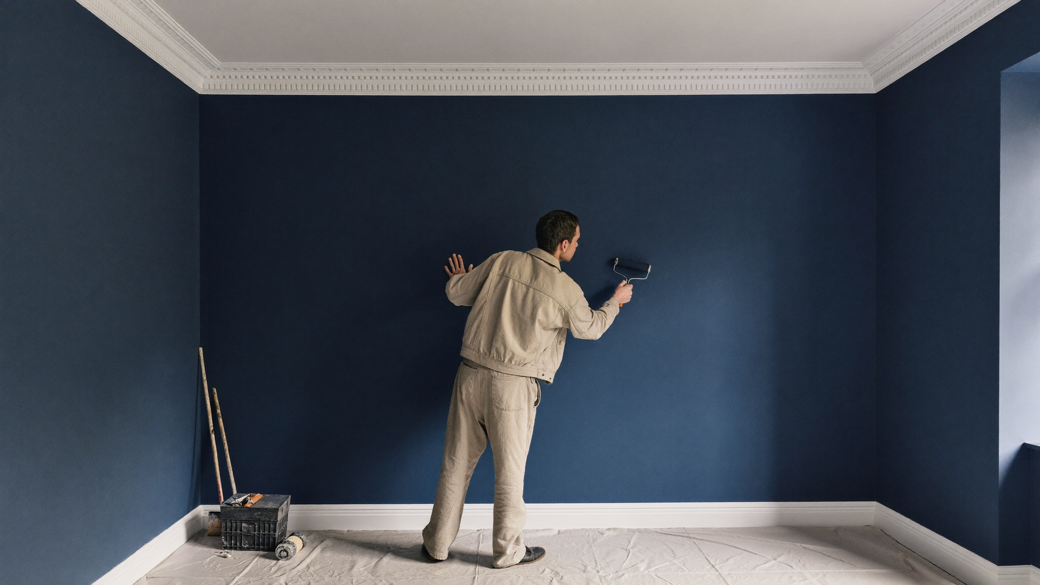 Decorator painting a period room
