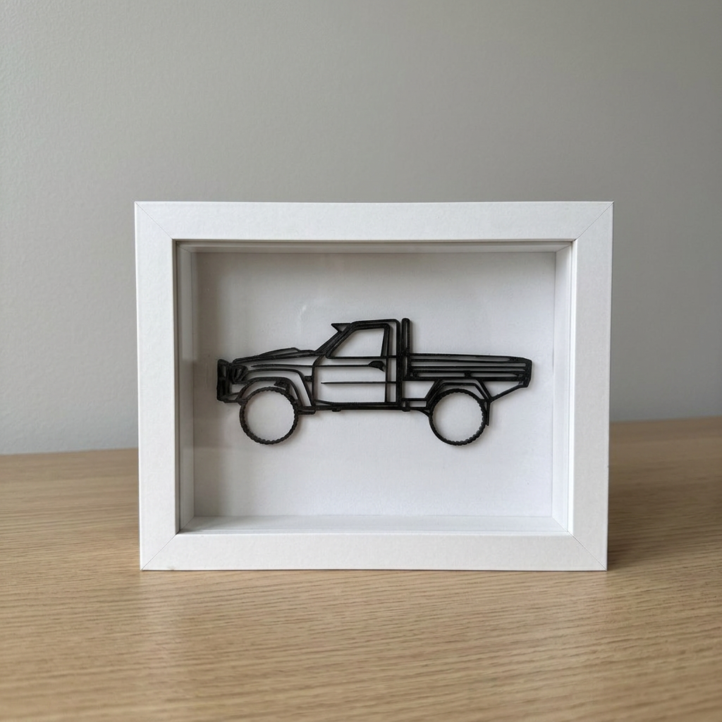 Desk piece — laser-cut vehicle line art