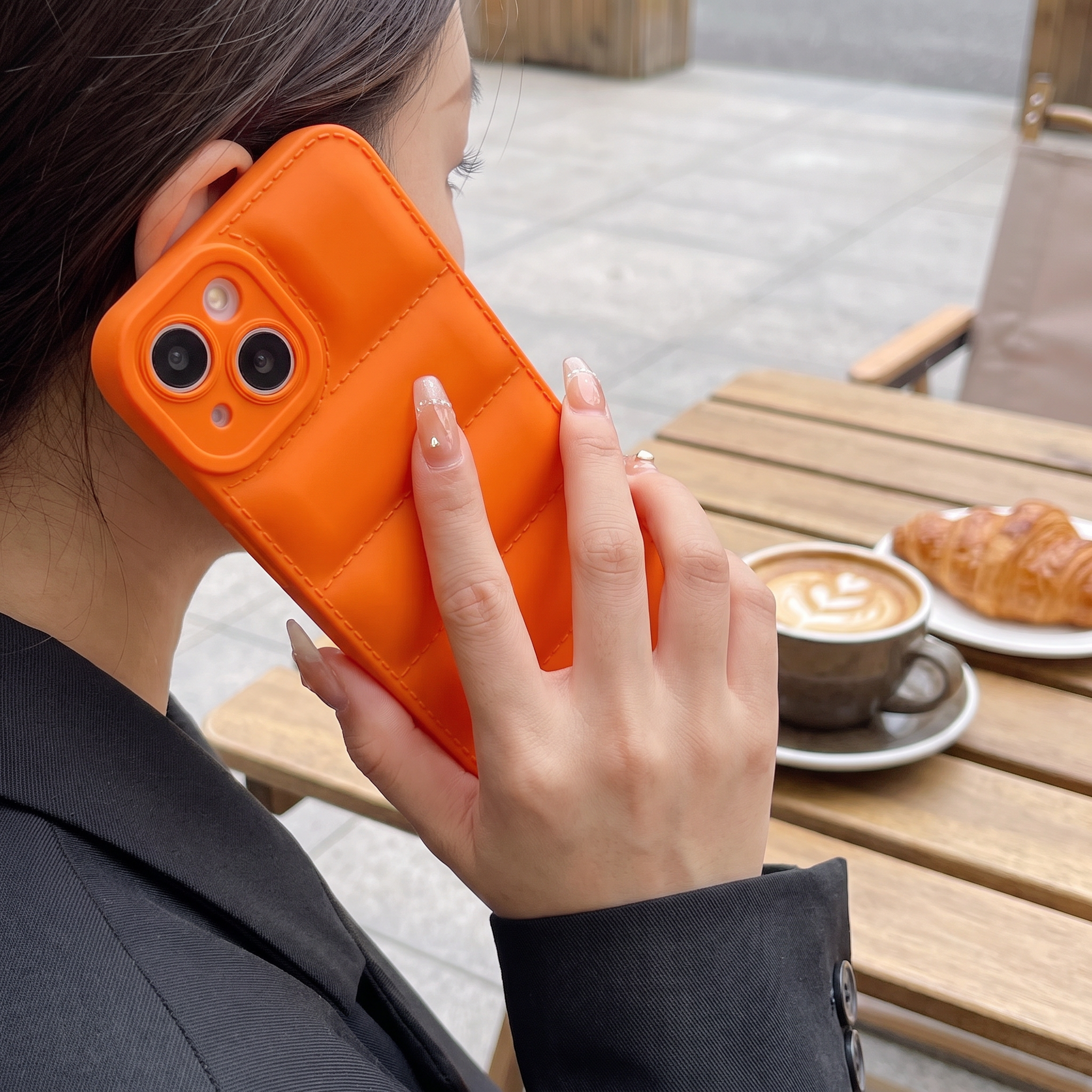 Puffer Jacket Silicone Phone Case (iPhone 13-17) -- in use